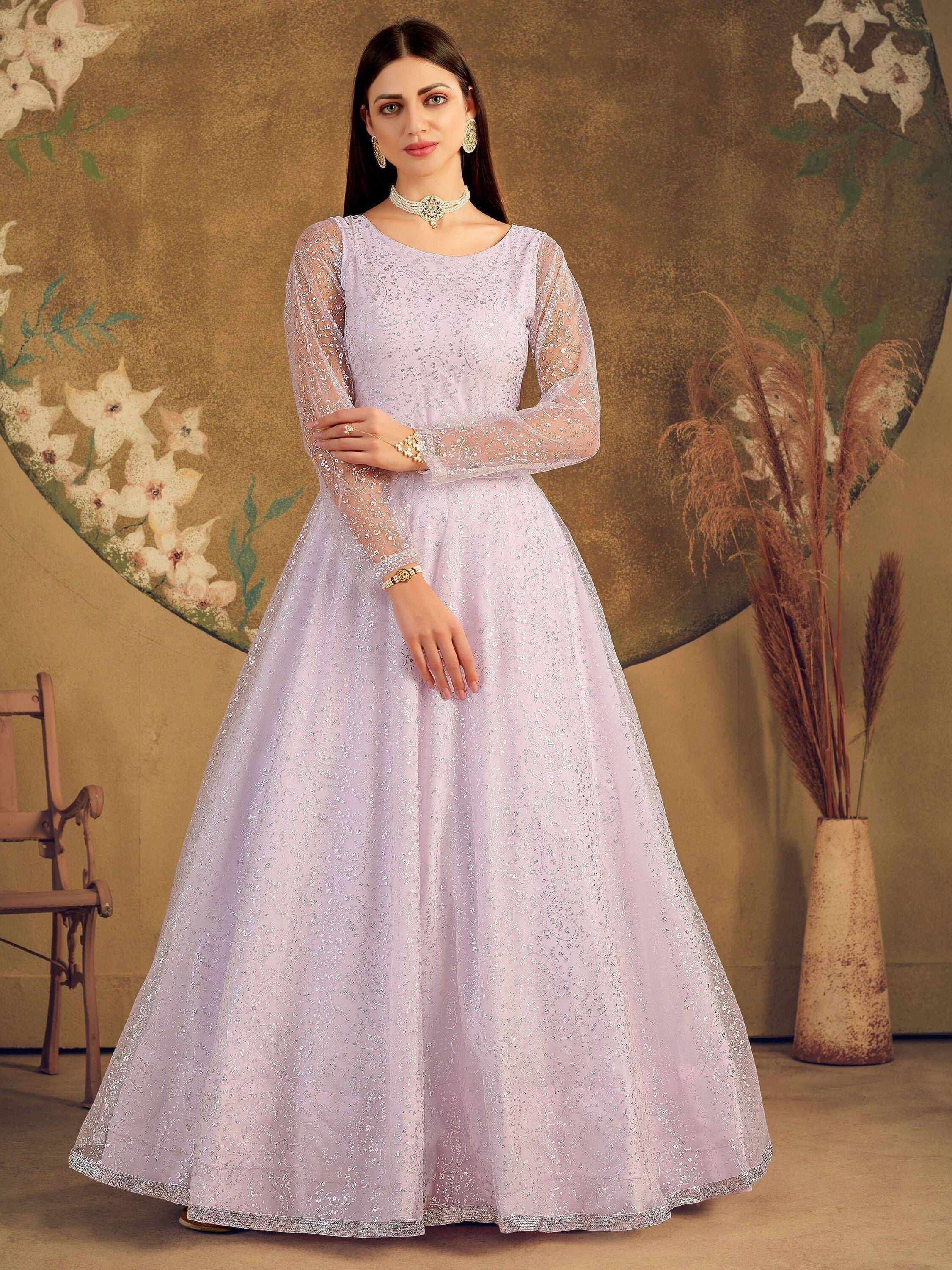 Lavender ethnic gown with silver embroidery, sheer sleeves, and flared skirt for Indian occasions