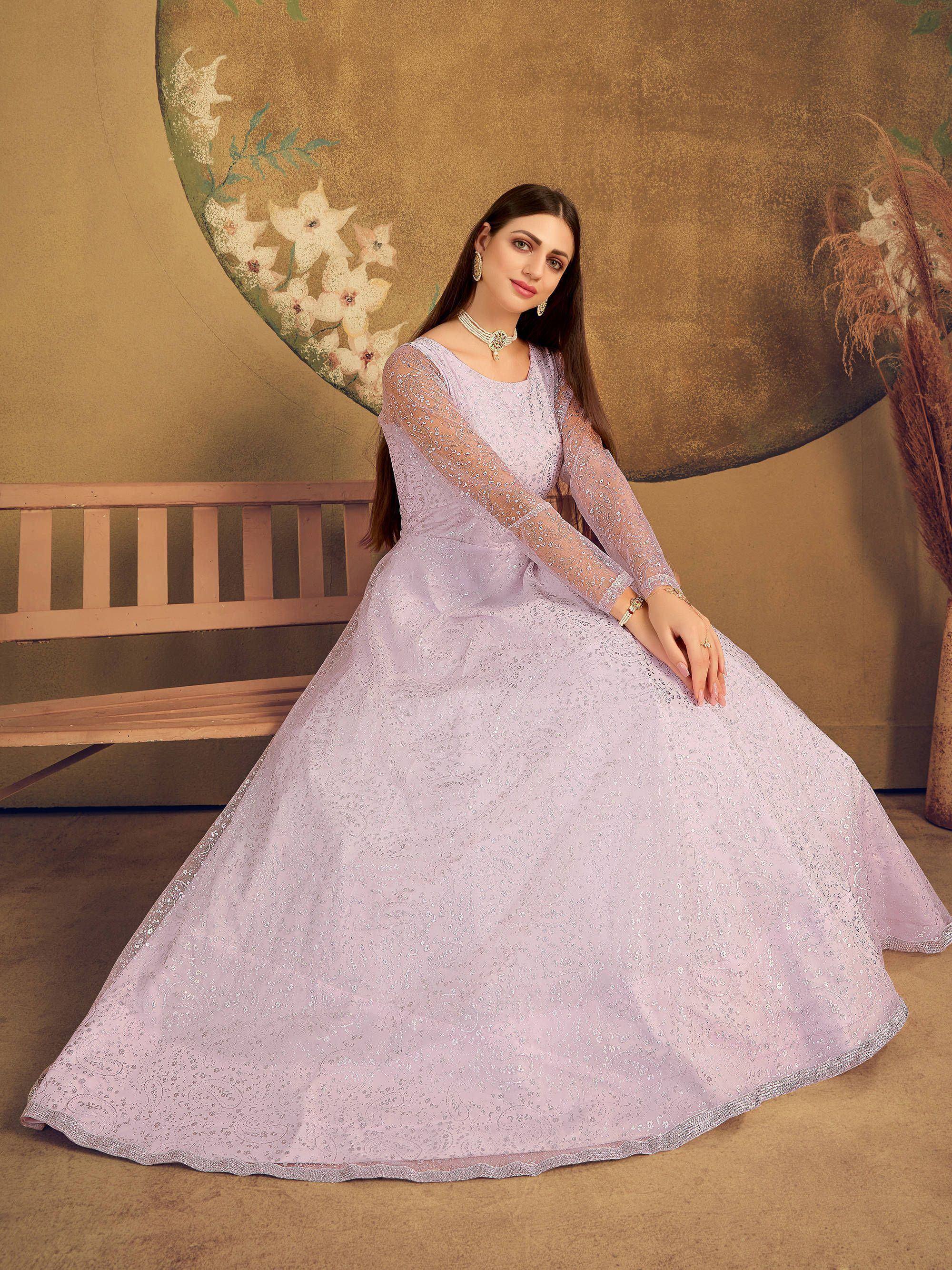 Lavender ethnic gown with intricate embroidery, perfect for Indian celebrations and festive occasions.