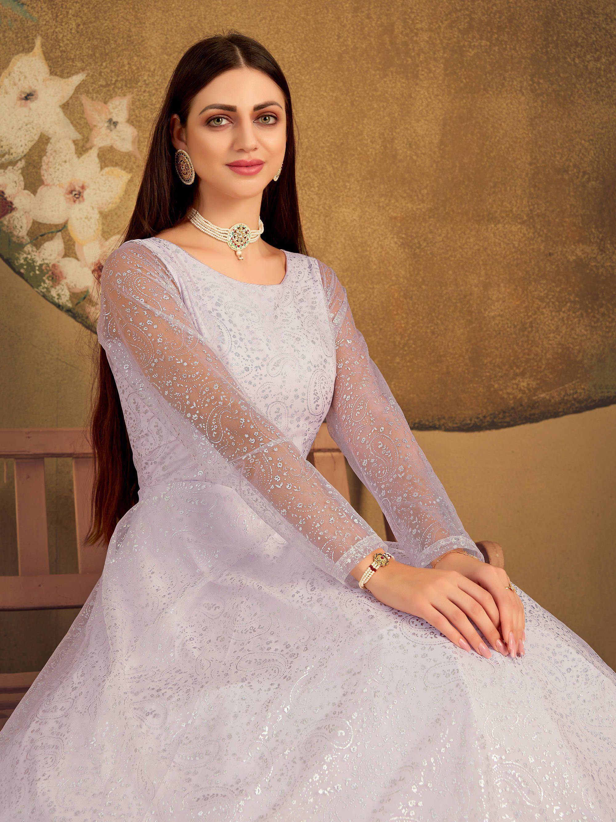 Elegant lavender ethnic gown with sheer sleeves and paisley embroidery, perfect for Indian celebrations.