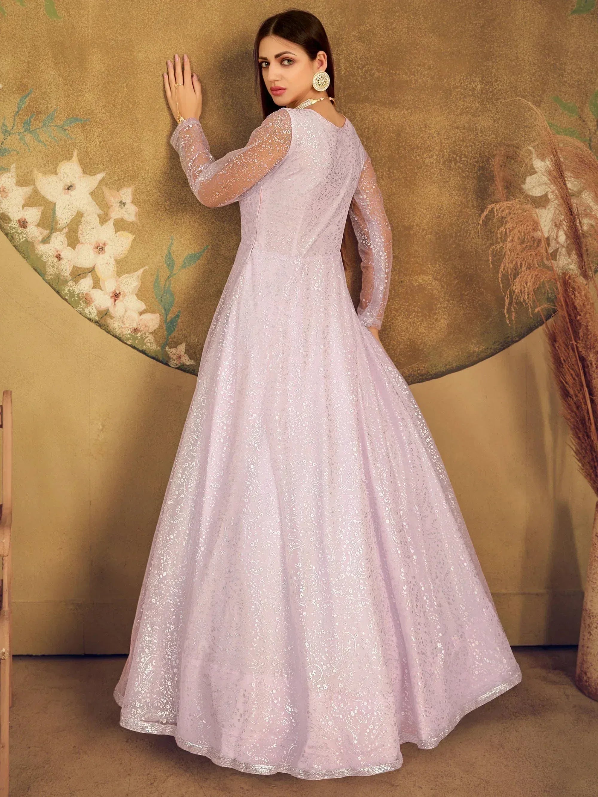 Lavender ethnic gown with sequin embroidery, long sleeves, and flared skirt for Indian occasions
