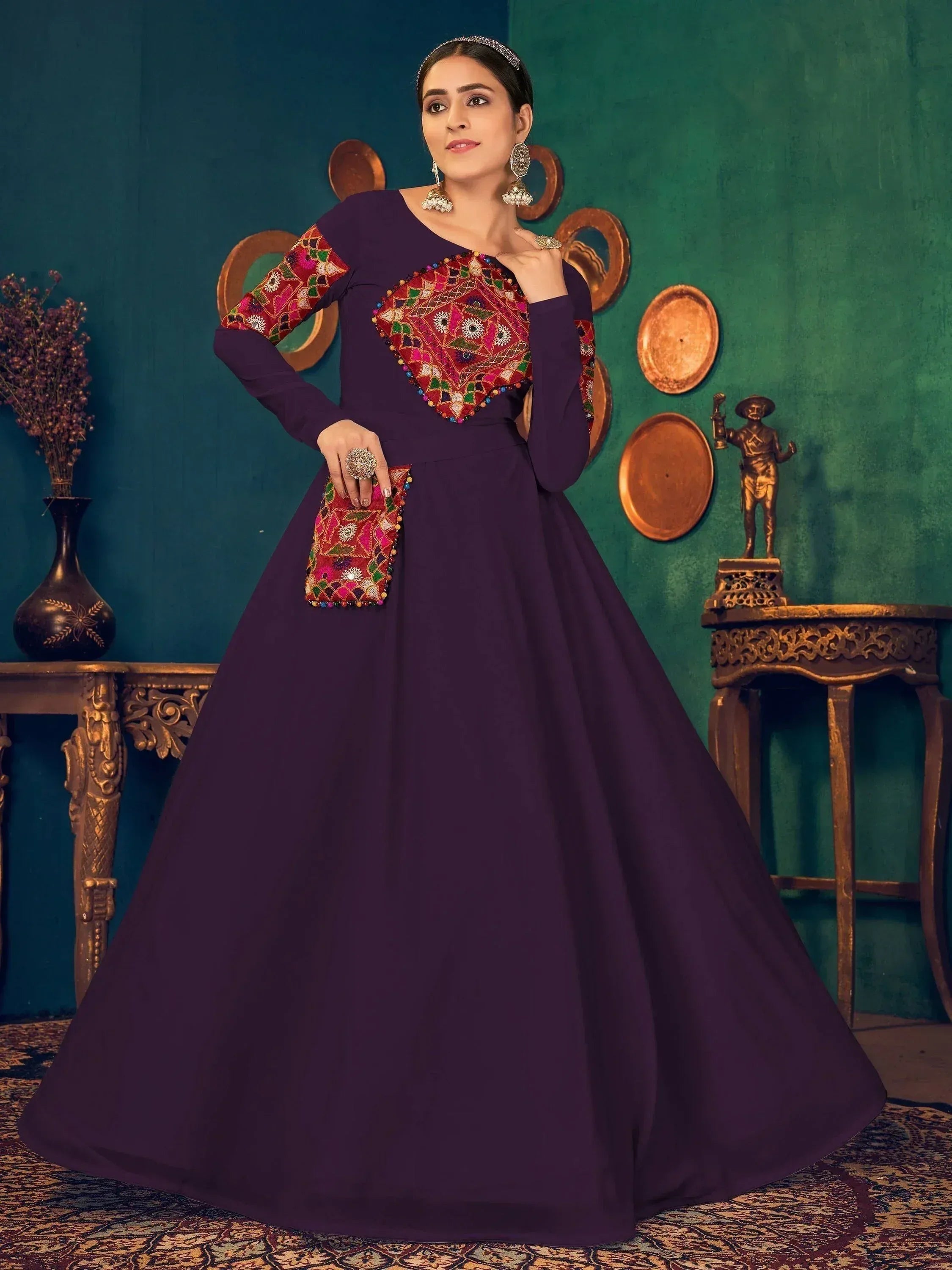 Purple ethnic gown with colorful mirror work, perfect for Indian weddings and parties