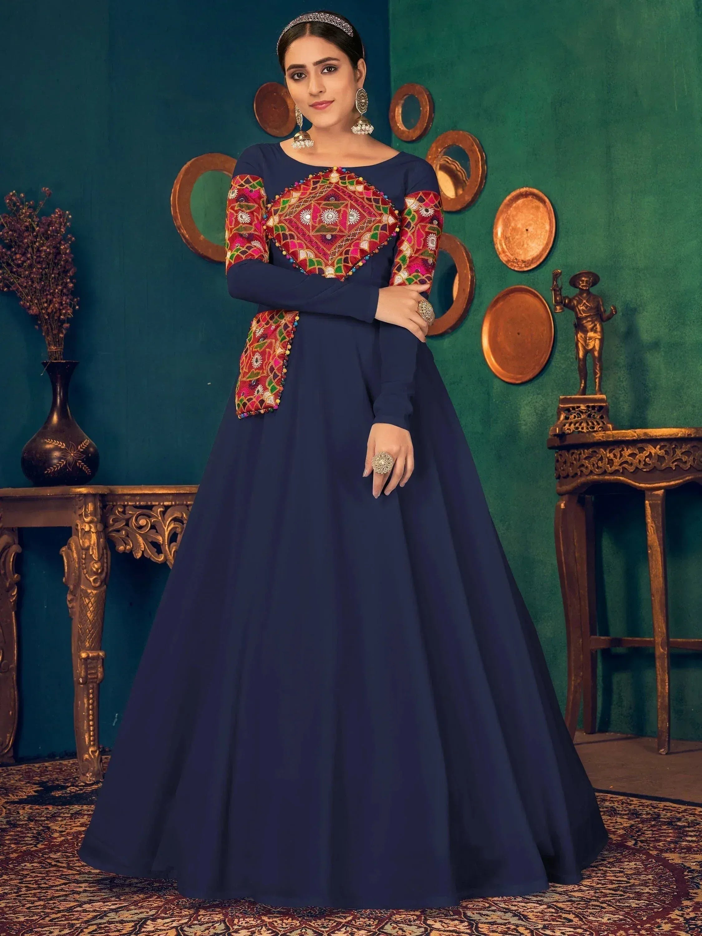 Navy blue ethnic gown with colorful embroidered yoke and sleeves, perfect for Indian occasions