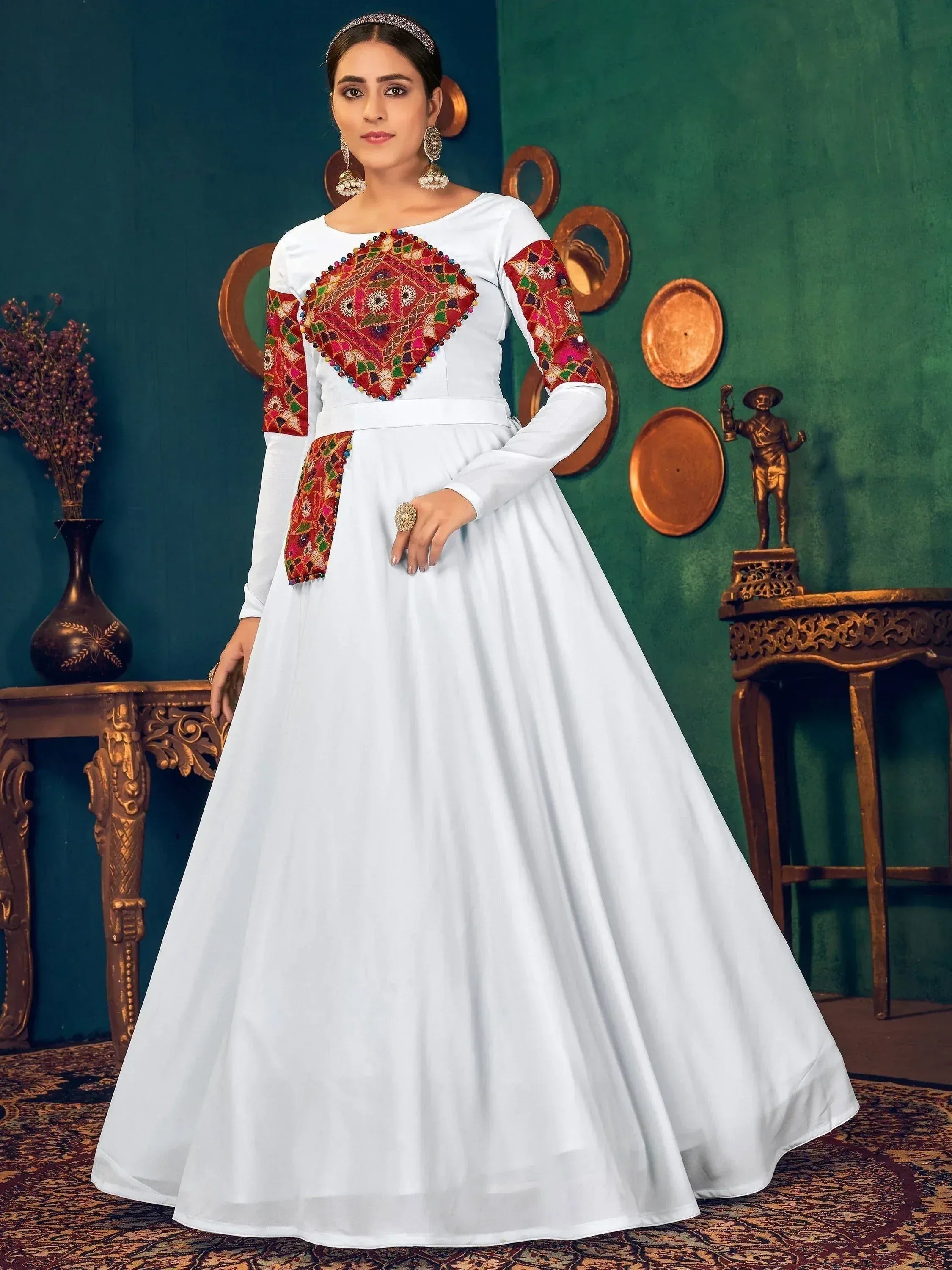 White ethnic gown with colorful embroidered panels, perfect for Indian festive occasions and weddings