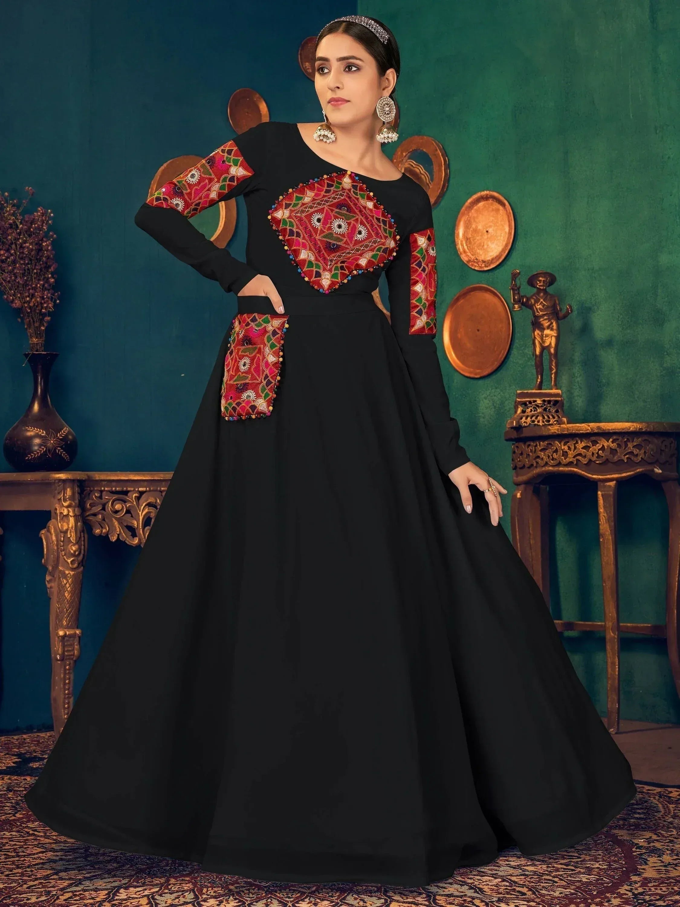 Black ethnic gown with colorful mirror work and embroidery, perfect for Indian occasions
