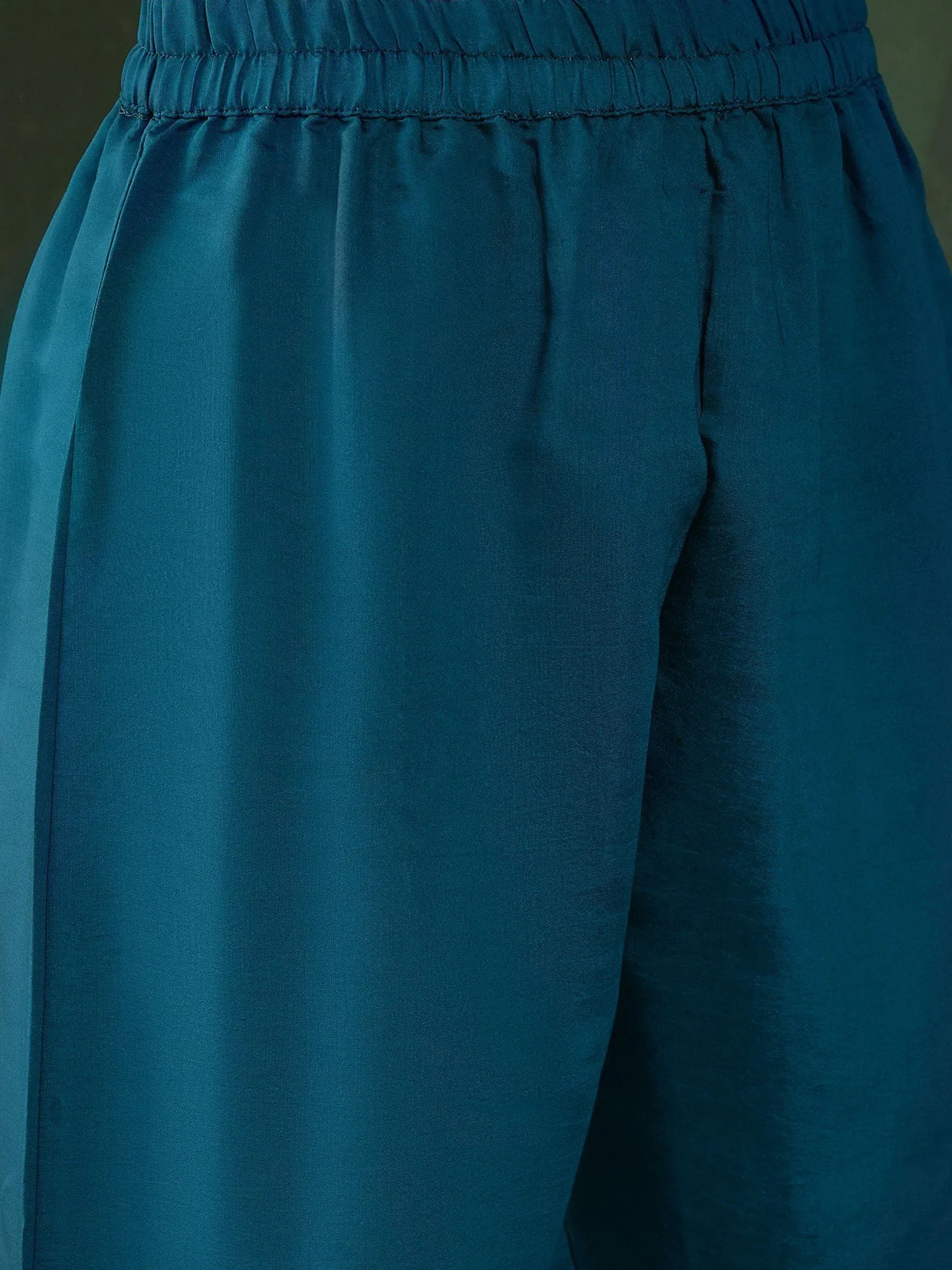 Teal ethnic palazzo pants with elastic waist, ideal for salwar kameez or fusion wear