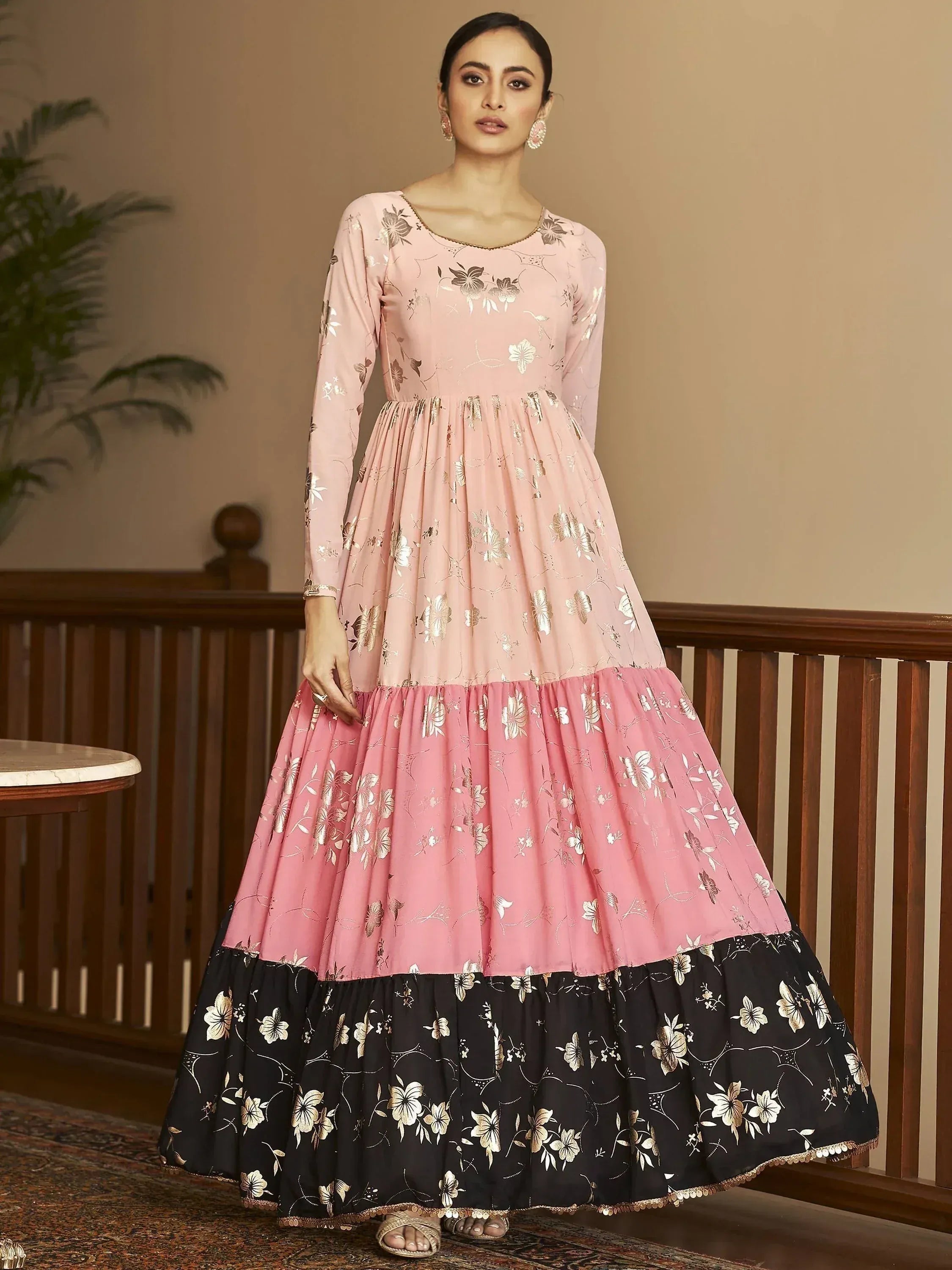 Pink and black floral printed anarkali gown with gold embroidery, perfect for ethnic occasions