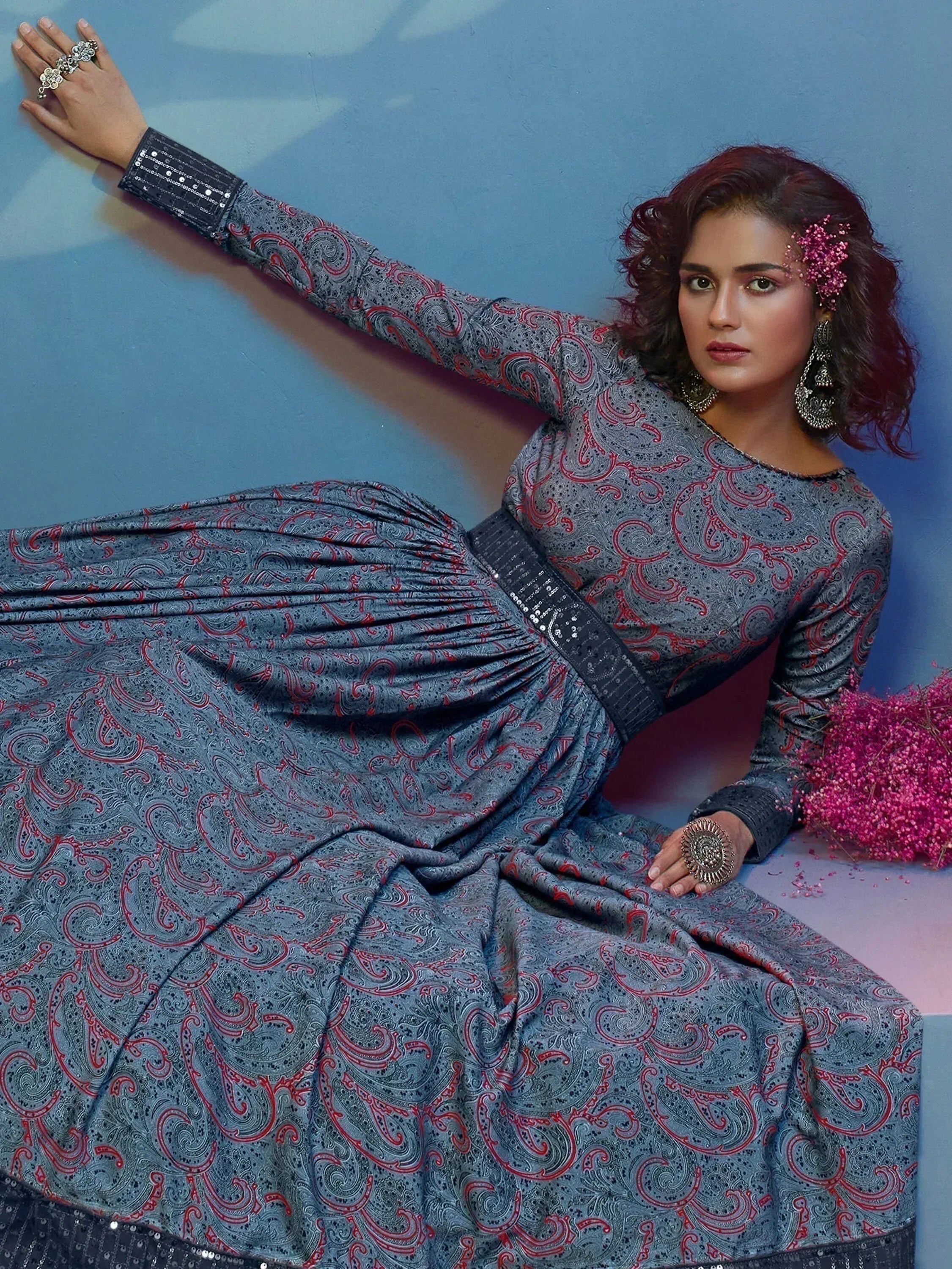 Woman in grey paisley ethnic gown with sequin cuffs, perfect for Indian festive occasions
