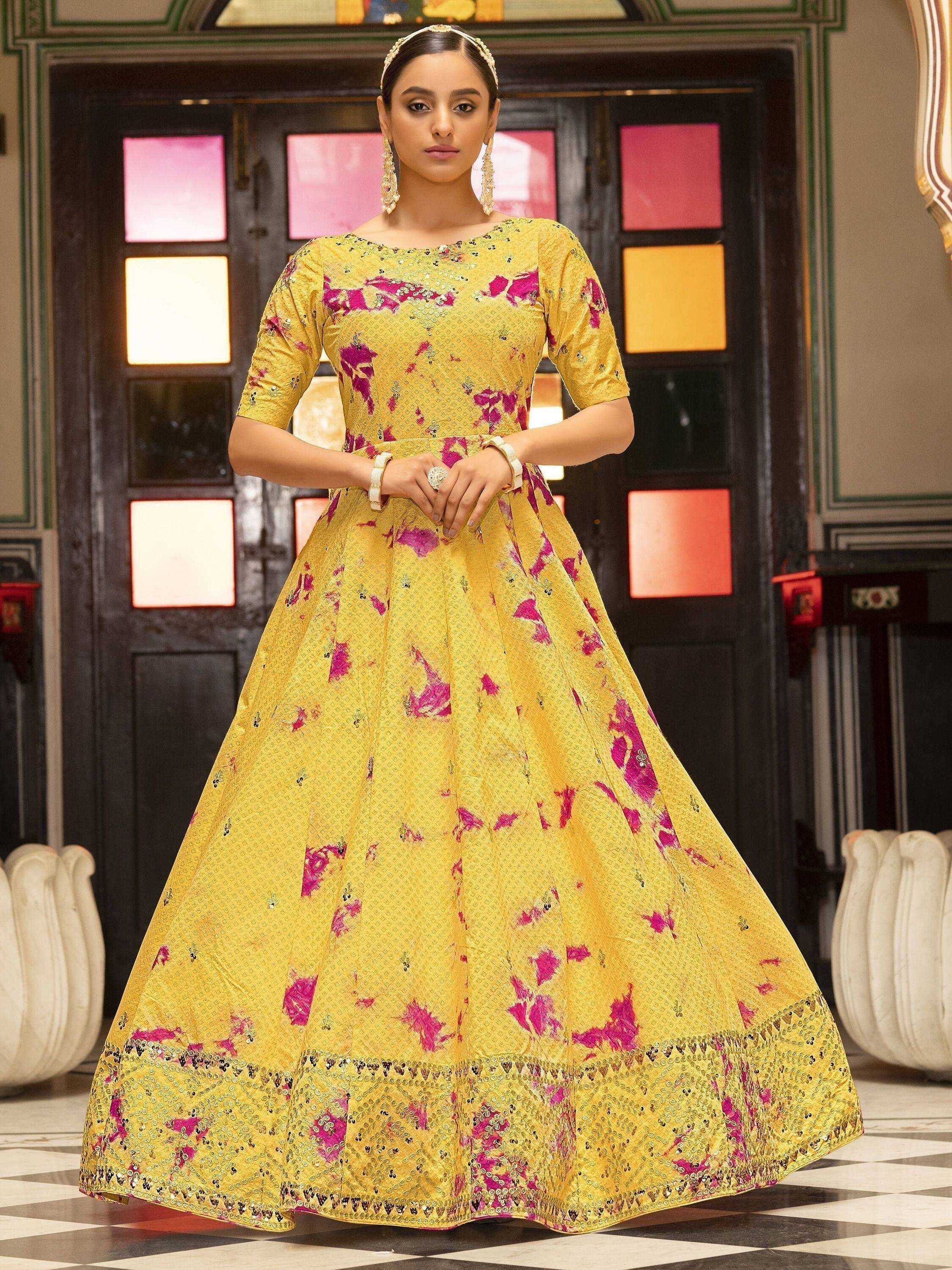 Yellow floral anarkali with pink print and sequin detailing, ethnic Indian wear for festive occasions