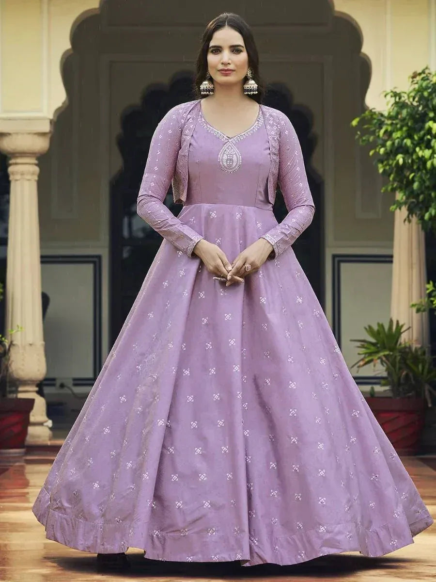 Lavender ethnic gown with embroidery, perfect for Indian weddings and festive occasions.