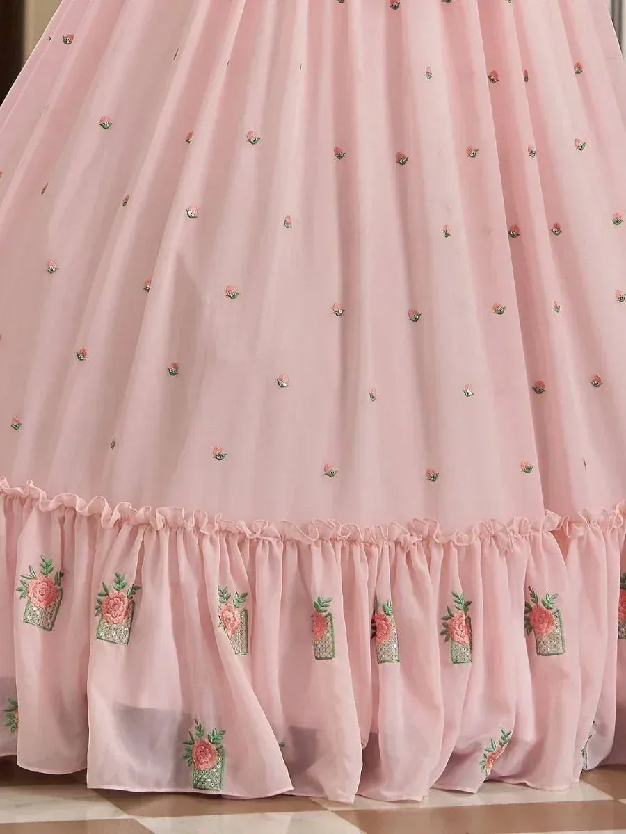 Pink floral embroidered lehenga skirt with ruffled hem, perfect for ethnic wear occasions