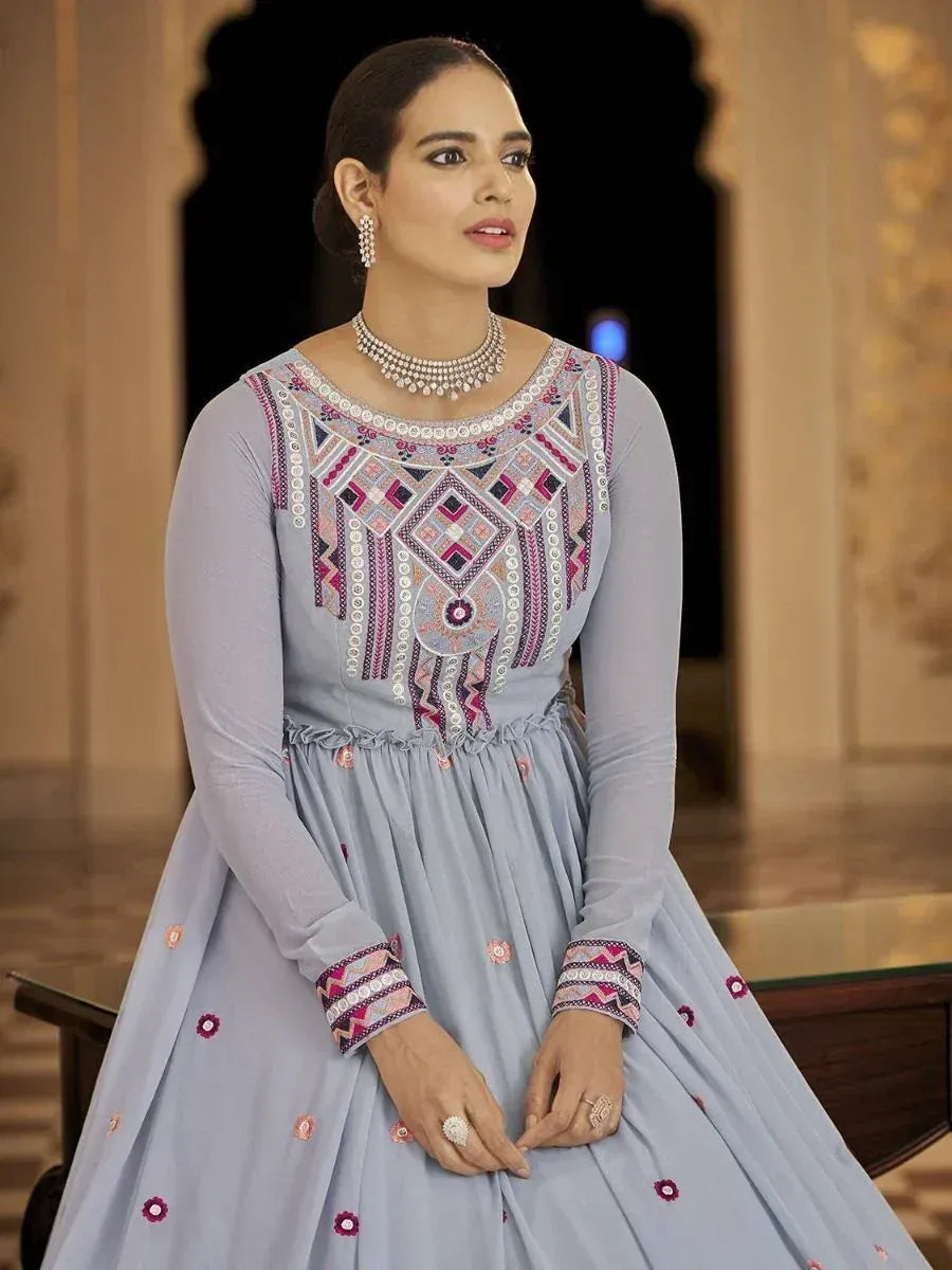Light blue ethnic gown with intricate geometric embroidery, perfect for Indian occasions and festive wear.