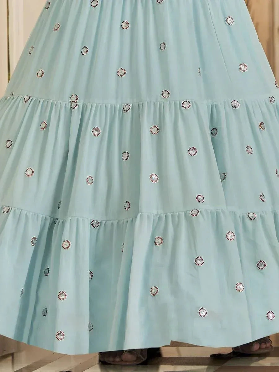 Light blue tiered ethnic gown with floral embroidery, perfect for Indian festive wear