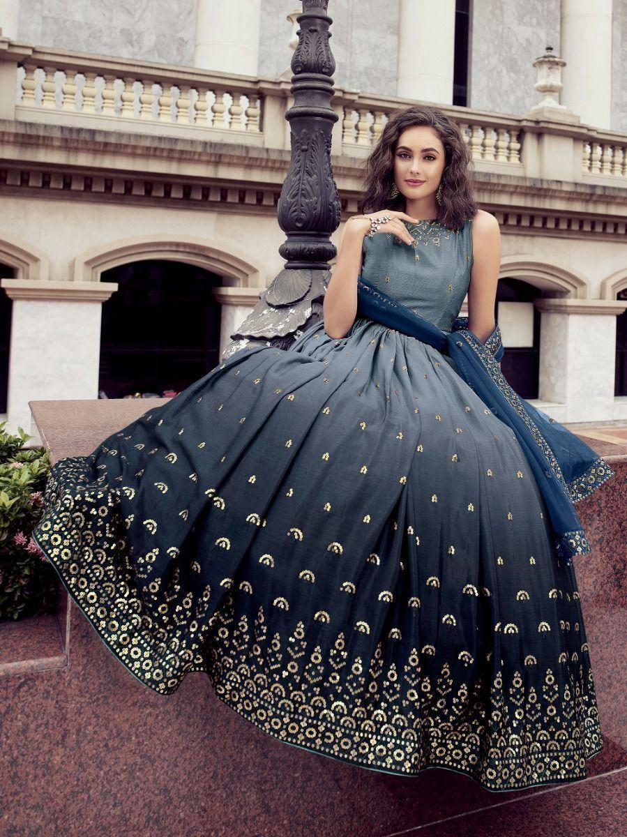Elegant dark blue lehenga choli with gold embroidery, perfect for Indian ethnic occasions