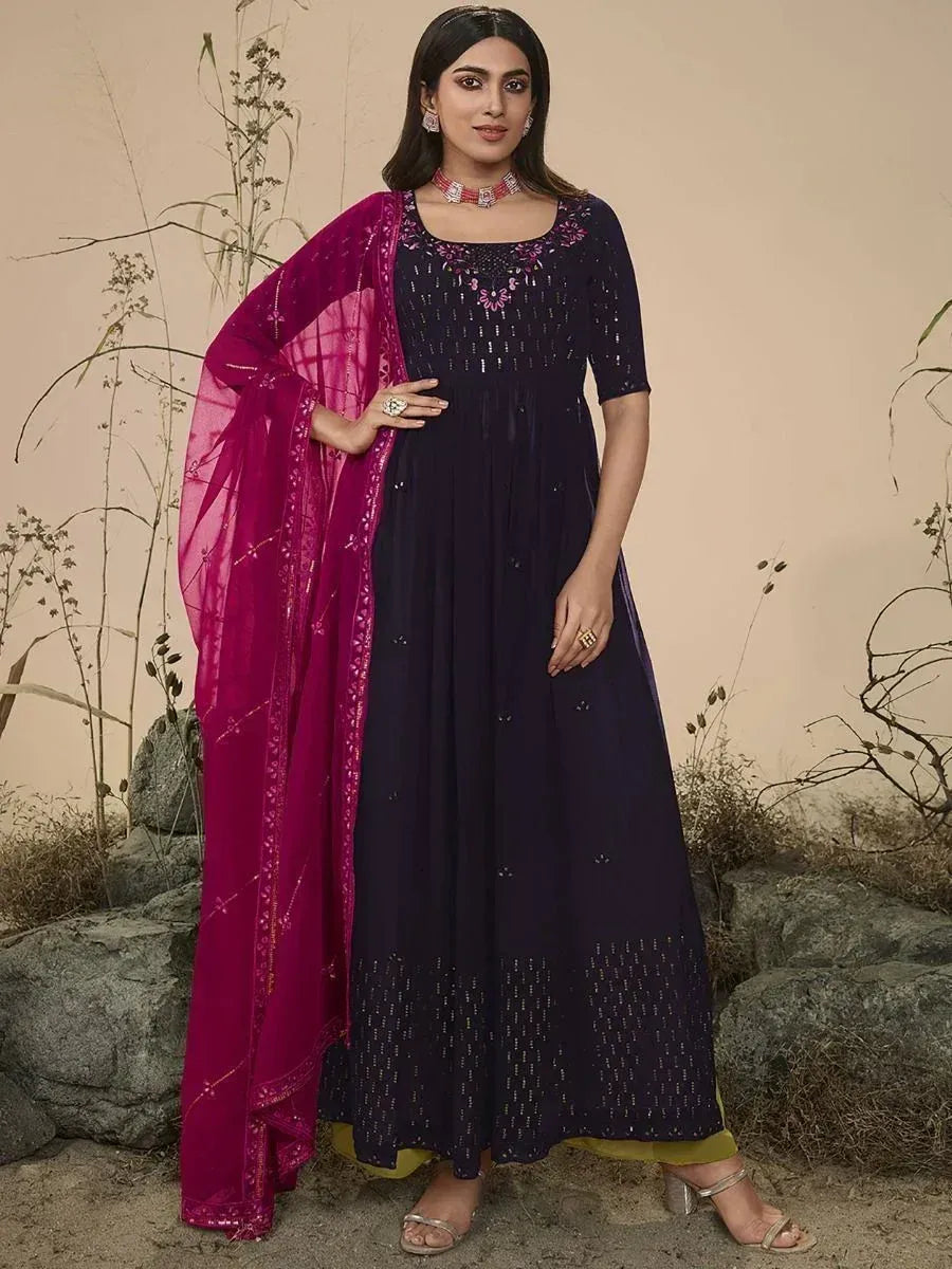 Woman in navy blue ethnic gown with magenta dupatta, Indian party wear fashion