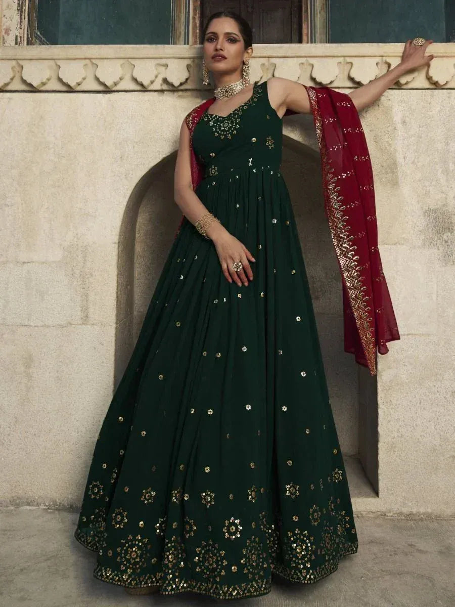 Emerald green designer anarkali with gold embroidery and red dupatta, ethnic Indian wear