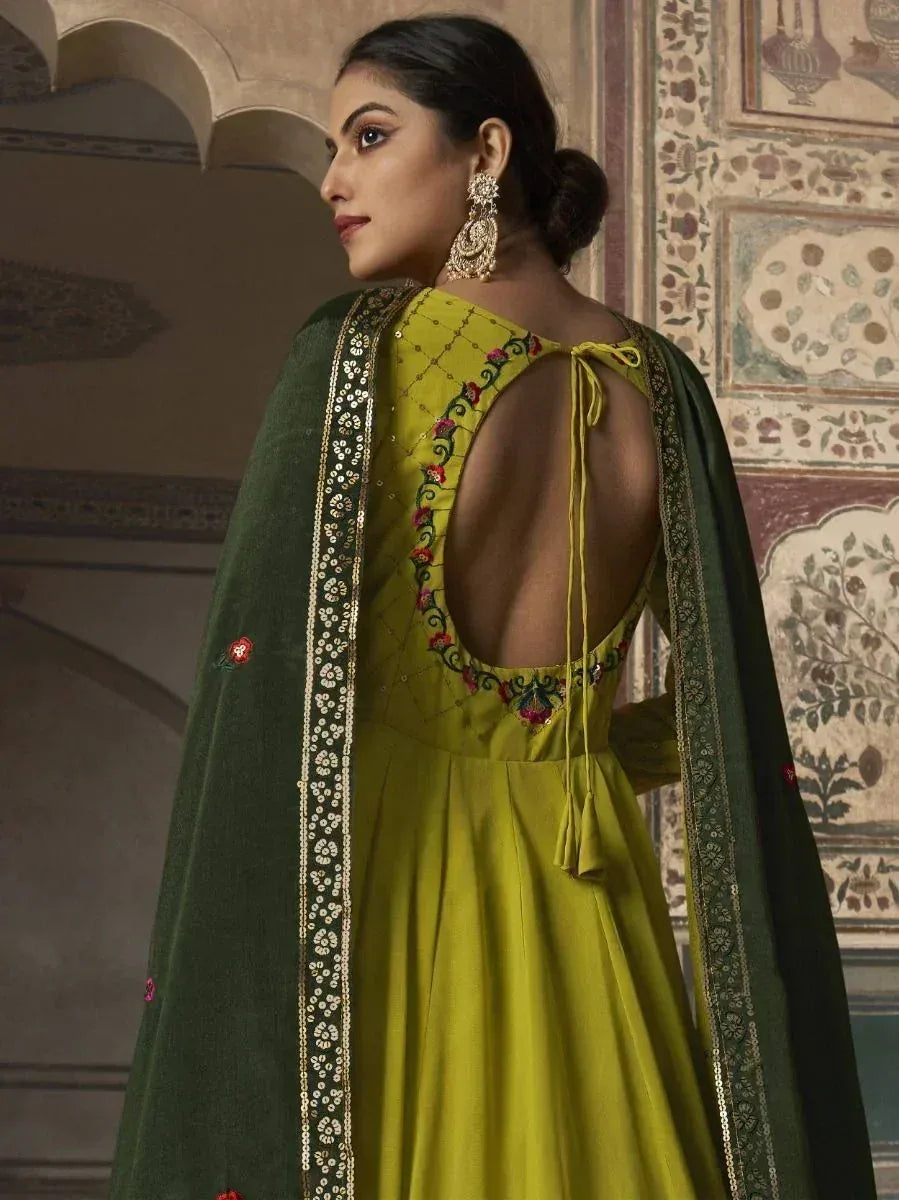 Yellow embroidered anarkali with green dupatta, backless design, ethnic Indian wear