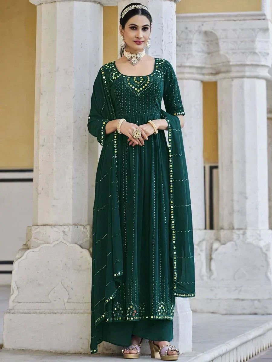 Woman in green mirror work Anarkali suit with dupatta, traditional Indian ethnic wear
