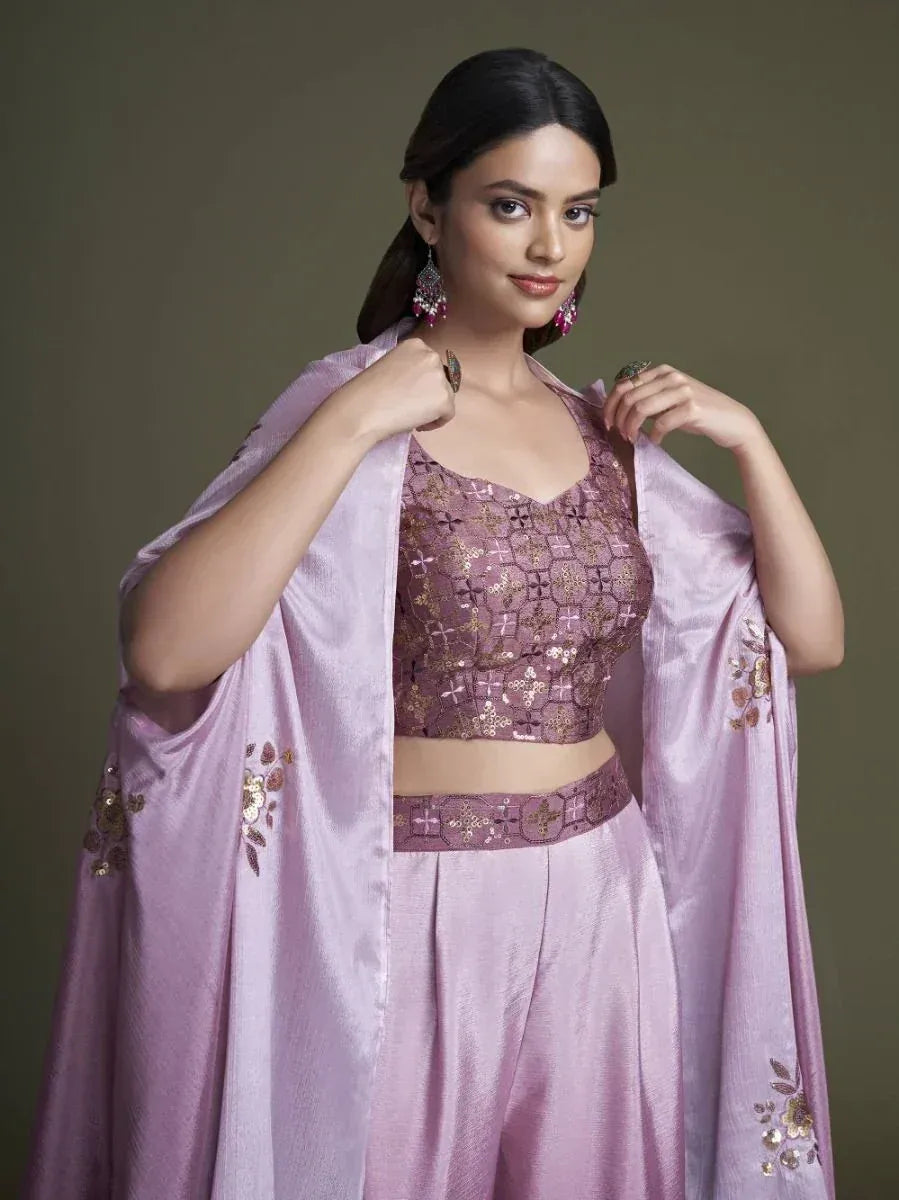 Woman wearing mauve embroidered lehenga choli with dupatta, Indian ethnic wear fashion