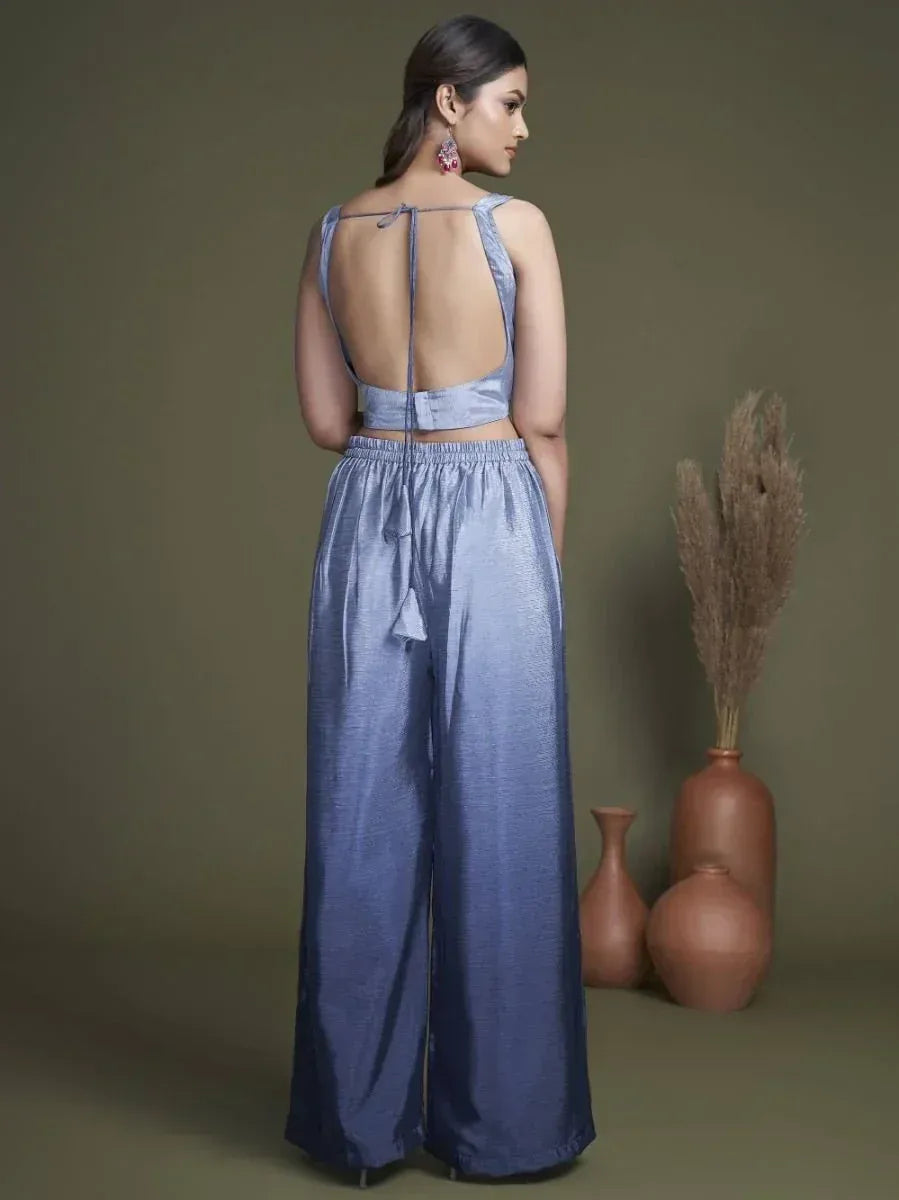 Blue ethnic palazzo set with backless top, wide-leg pants, and tie details for Indian wear