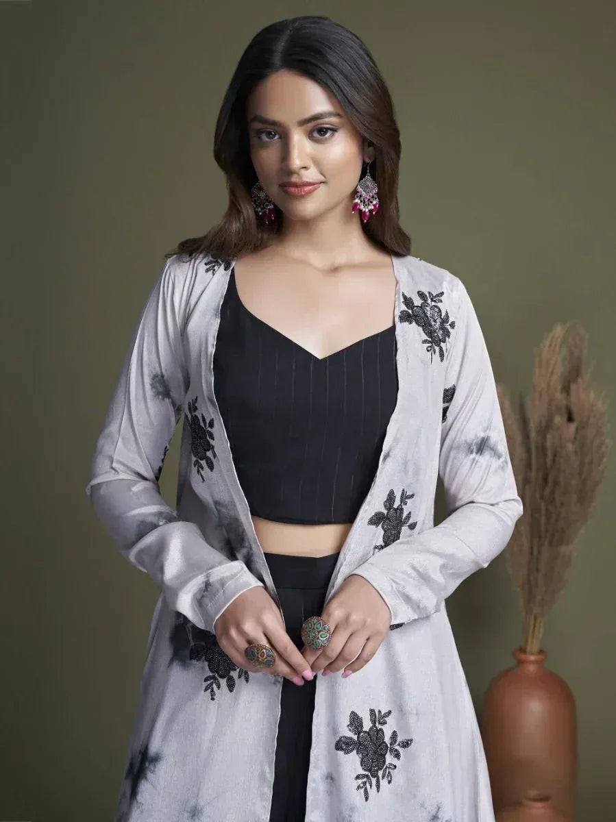 Stylish black and white embroidered ethnic kurti with floral detailing, perfect for Indian wear