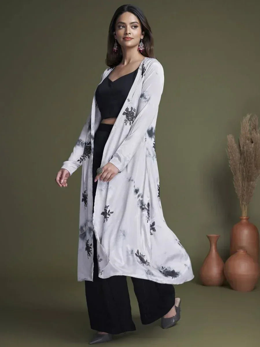 White floral embroidered long kimono over black crop top and palazzo pants, ethnic wear style