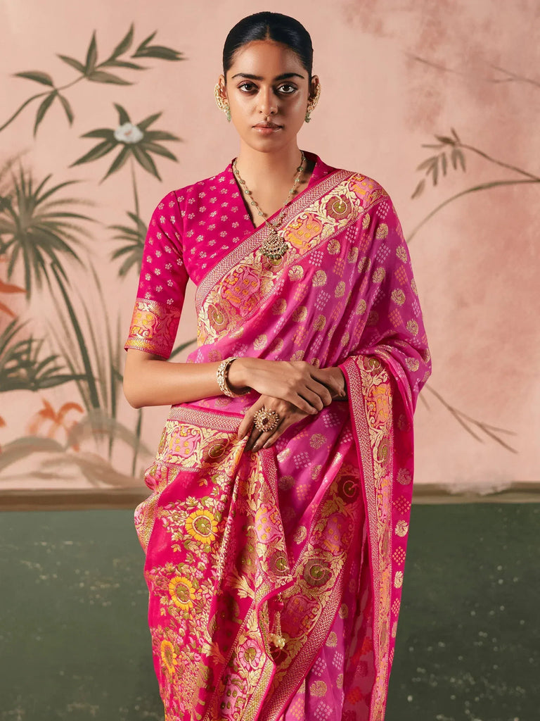 Pink floral saree with gold embroidery, perfect for Indian ethnic wear occasions.