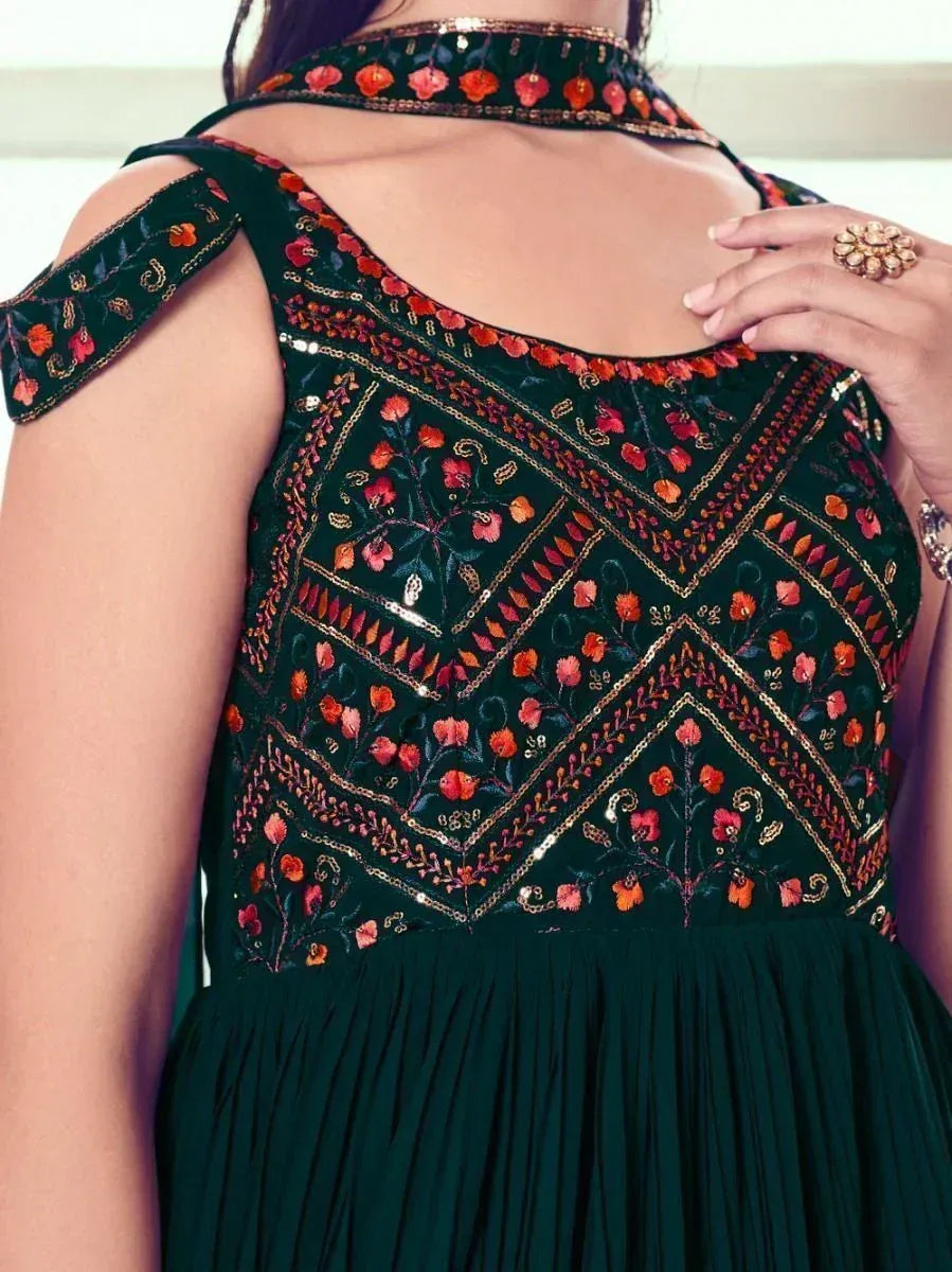 Dark green embroidered ethnic gown with floral motifs and cold shoulder design