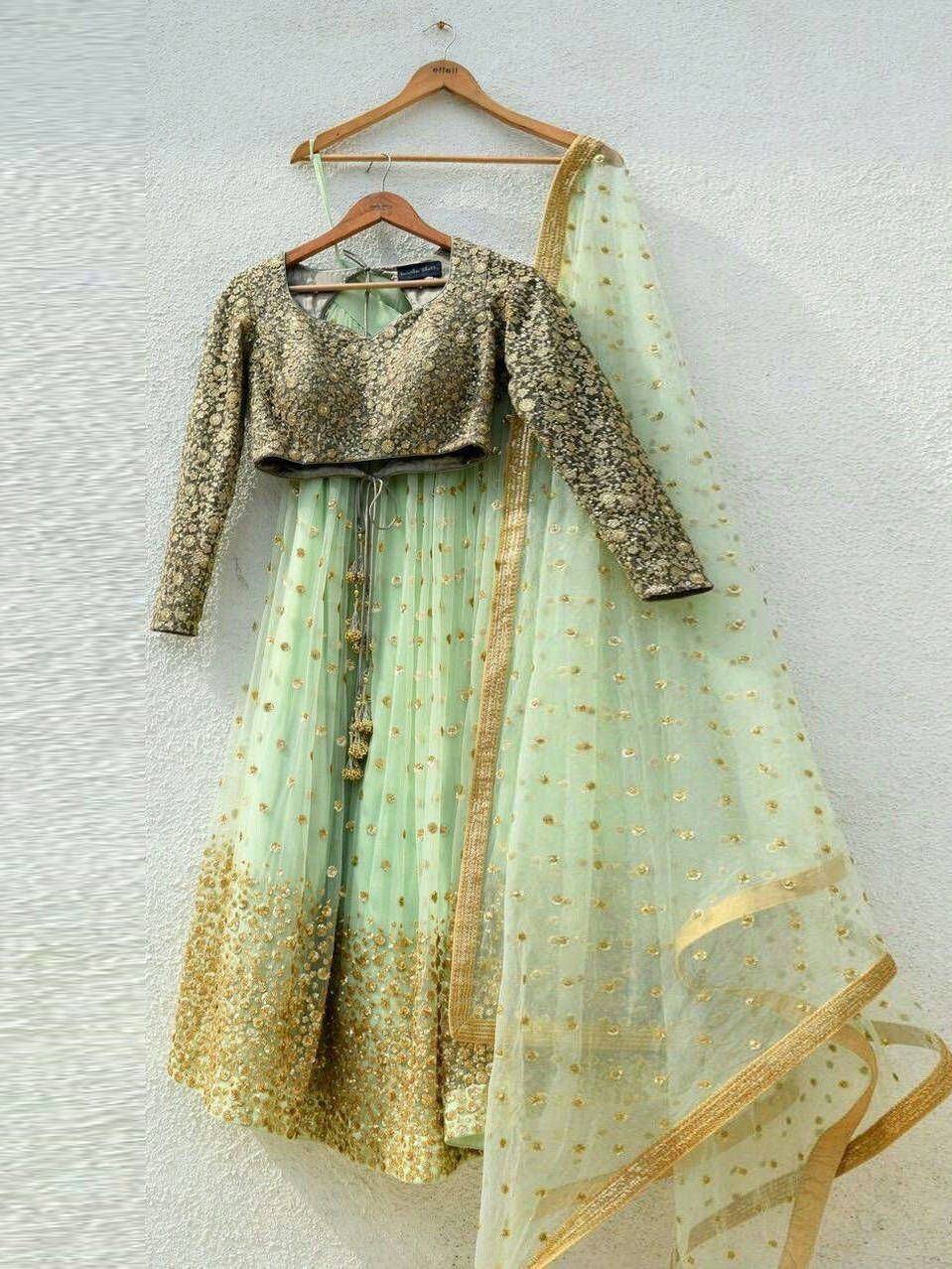 Mint green lehenga choli with gold embroidery, perfect for Indian ethnic wear and festive occasions