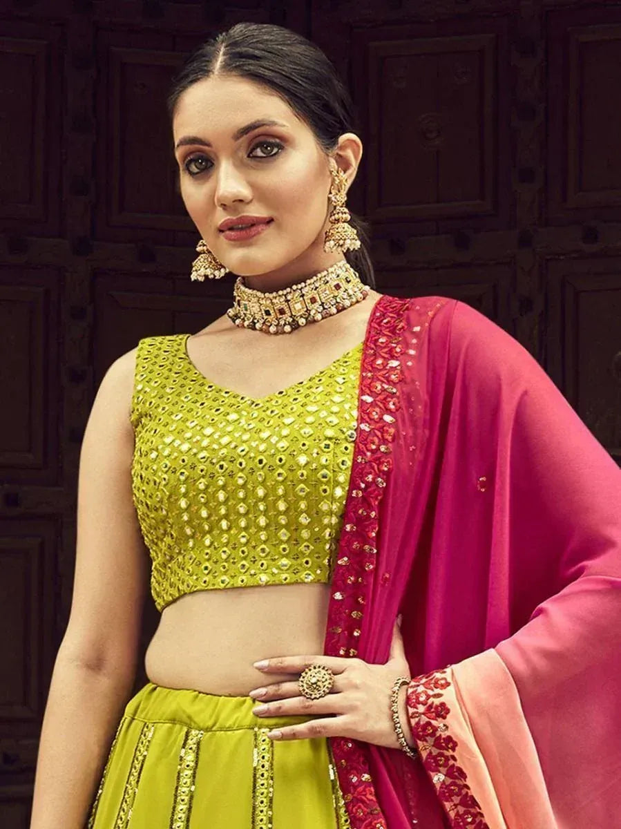 Lime green designer lehenga choli with pink dupatta, perfect for Indian ethnic wear events
