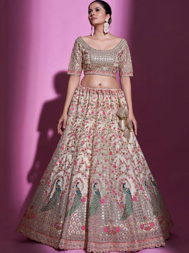 Unimaginable Cream Sequins Embroidered Soft Net Lehenga Choli