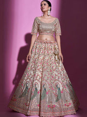 Unimaginable Cream Sequins Embroidered Soft Net Lehenga Choli