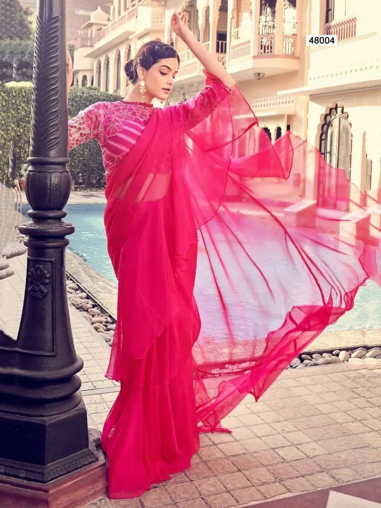Ravishing Pink Sequins Orangza Party Wear Ruffle Saree With Blouse
