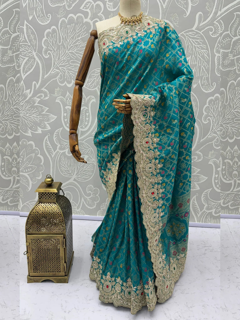 Alluring Teal Green Zari Weaving Silk Event Wear Saree With Blouse