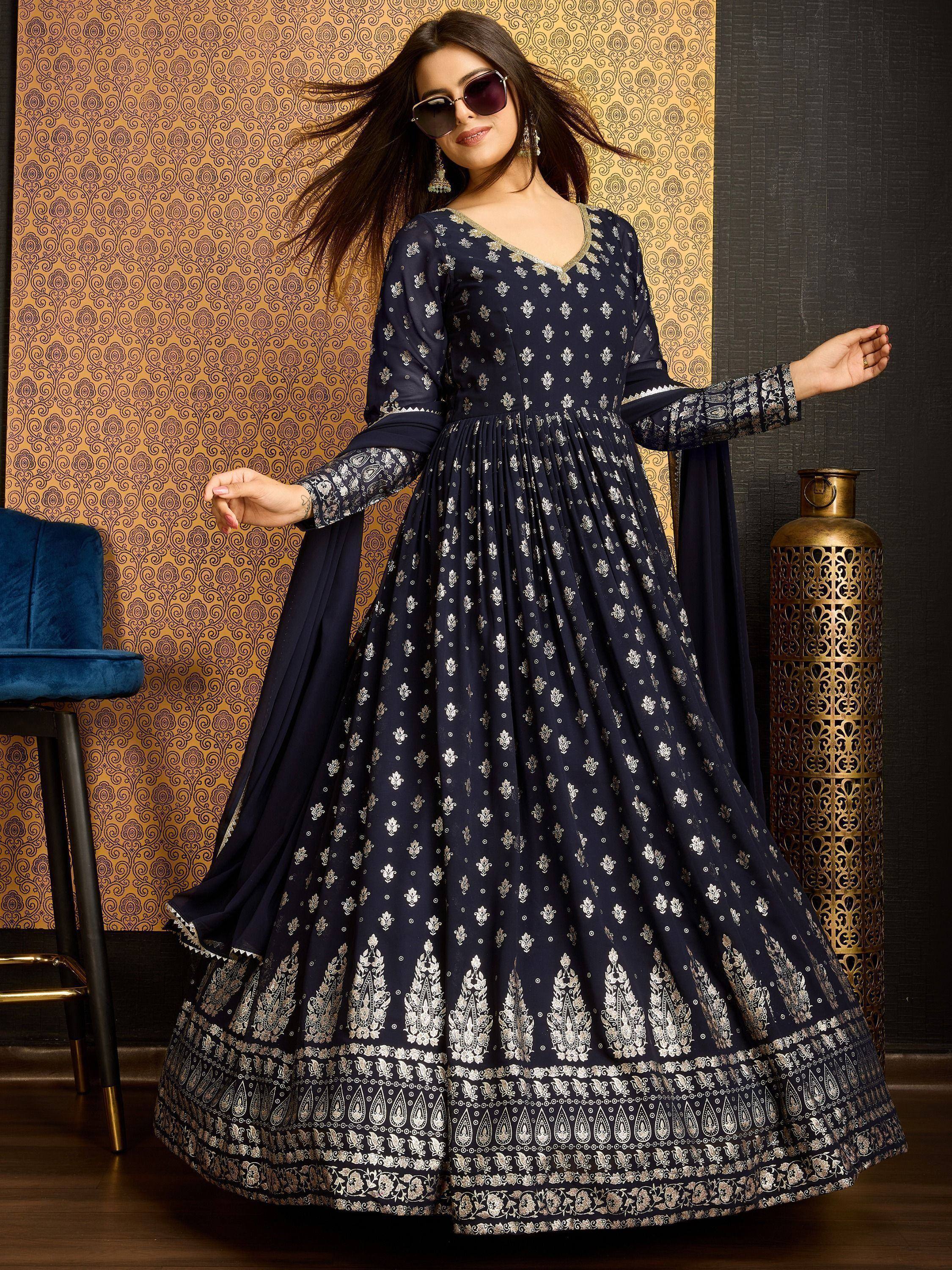 Navy blue ethnic gown with white floral print, perfect for Indian occasions and festive wear.