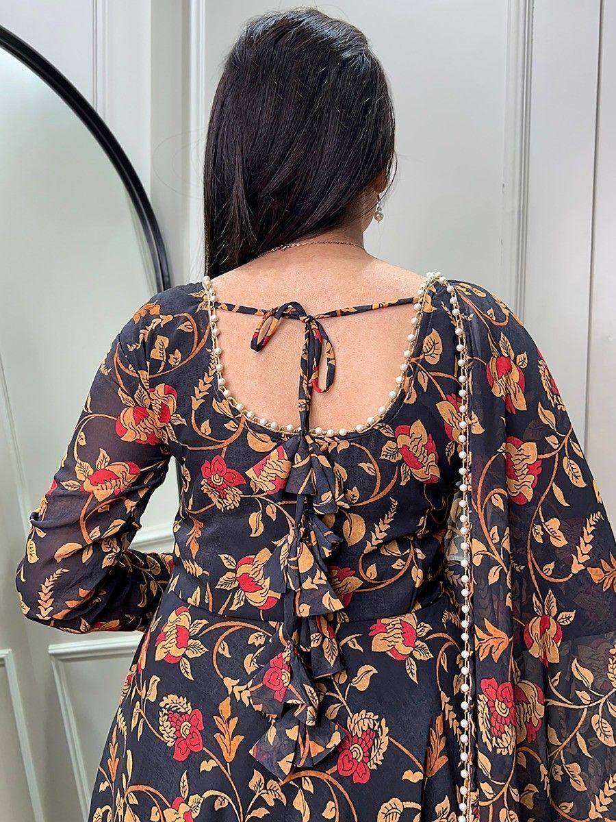 Floral print ethnic gown with pearl trim and back tie detail, perfect for Indian occasions