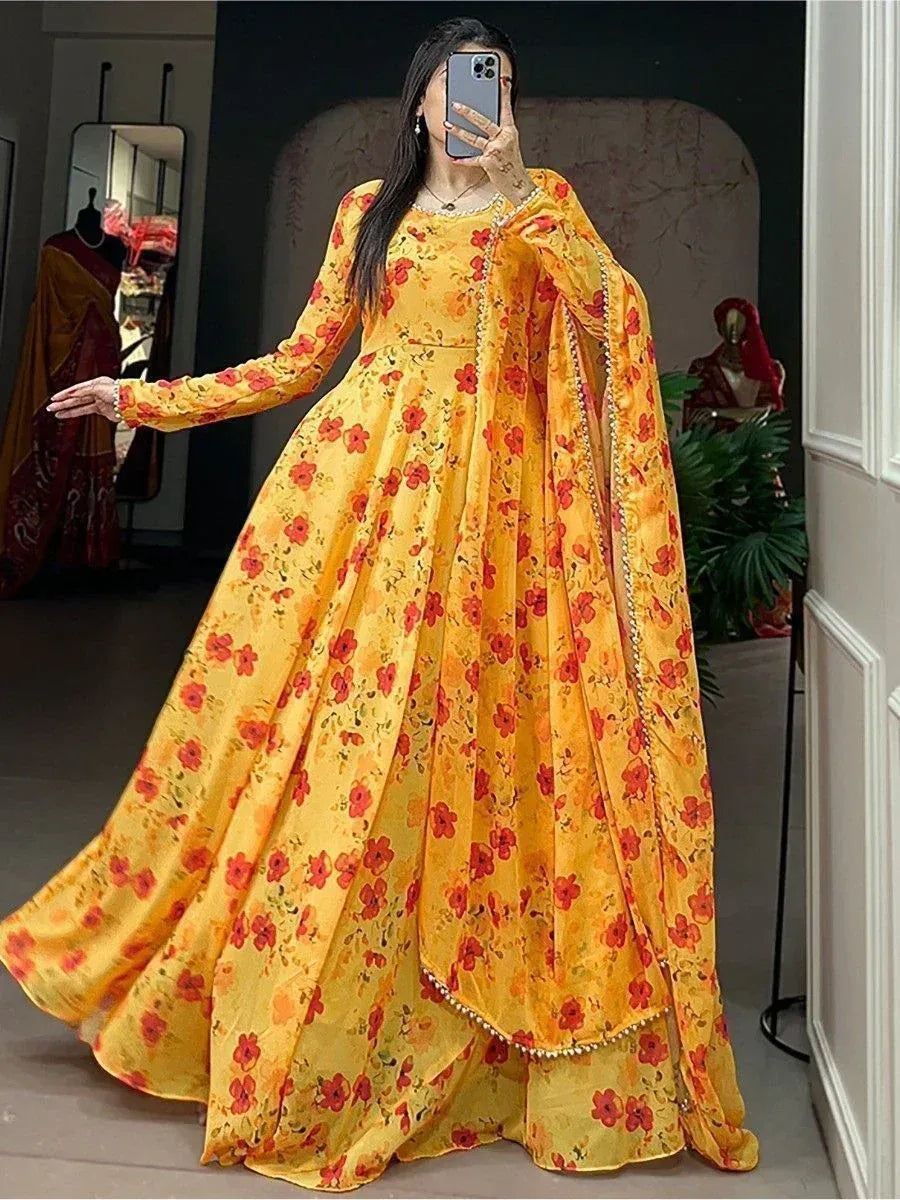 Yellow floral Anarkali gown with red blooms, perfect for Indian ethnic wear occasions