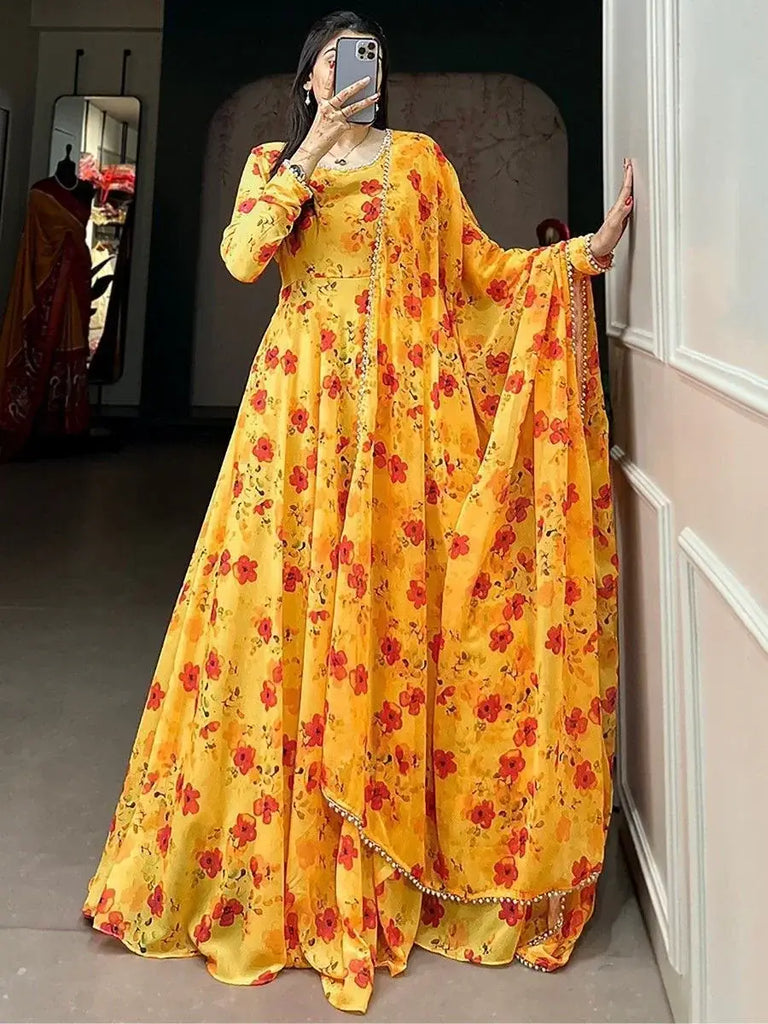 Glamorous Yellow Floral Printed Georgette Haldi Wear Gown With Dupatta