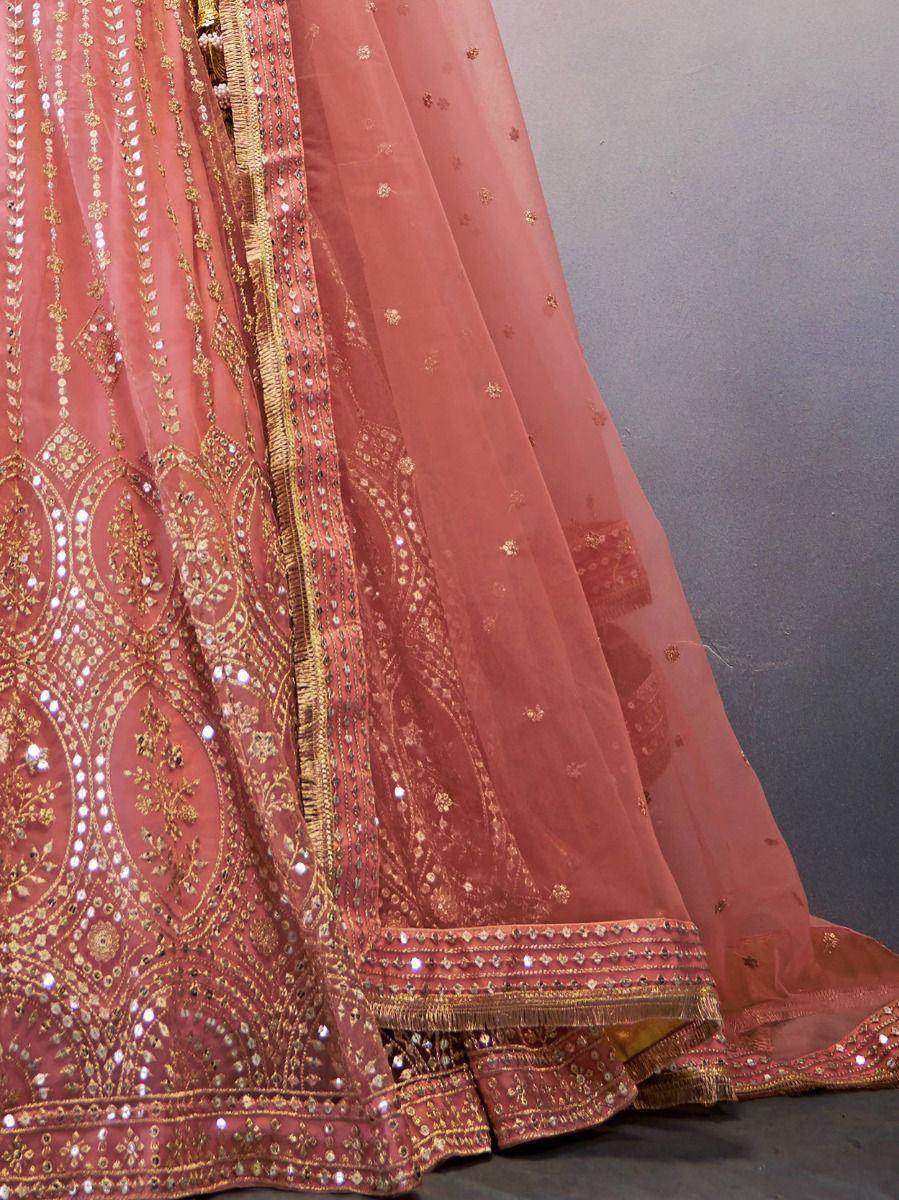 Pink designer lehenga with gold embroidery and mirror work, ethnic Indian wear