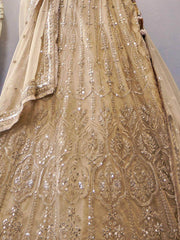 Fascinating Beige Sequines Embroidery Net Party Lehenga Choli