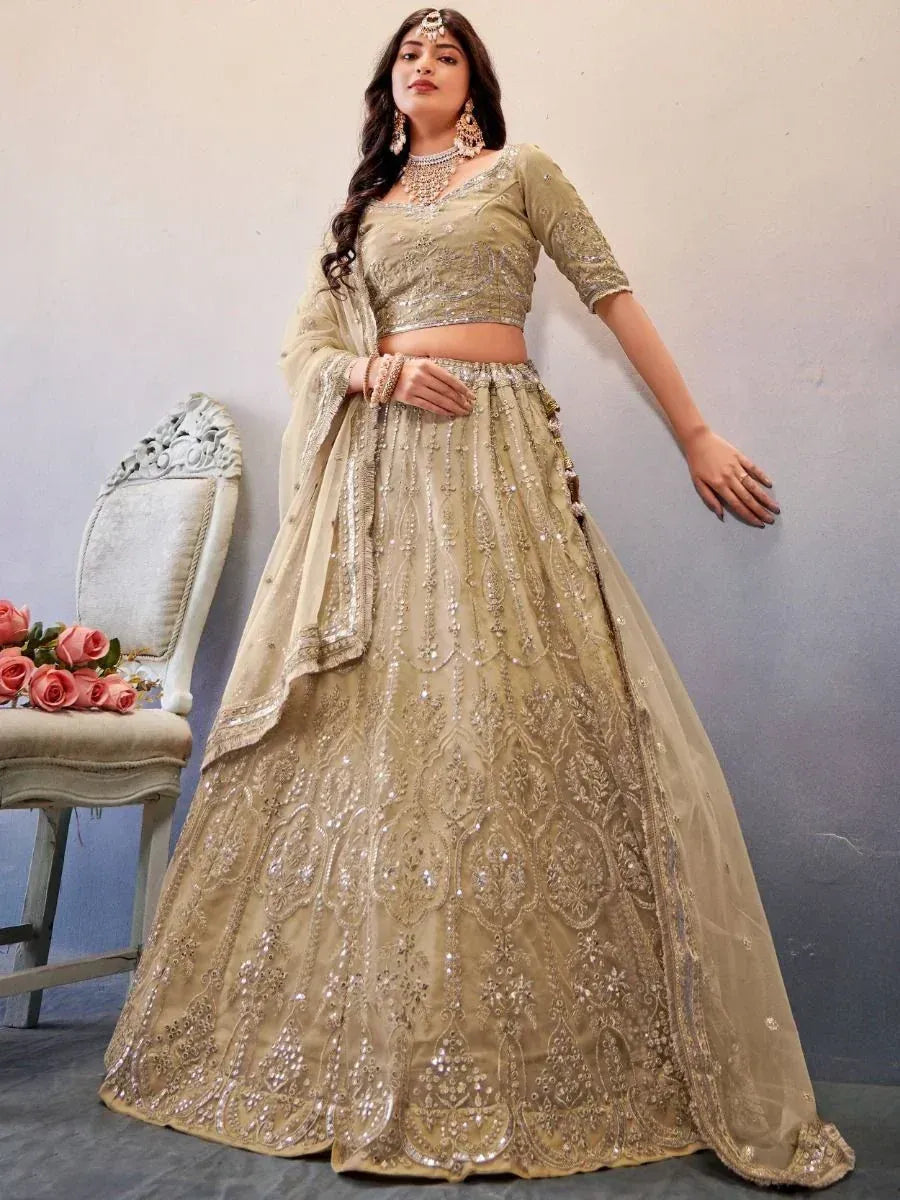 Beige embroidered lehenga choli with sequins, perfect for weddings and festive occasions
