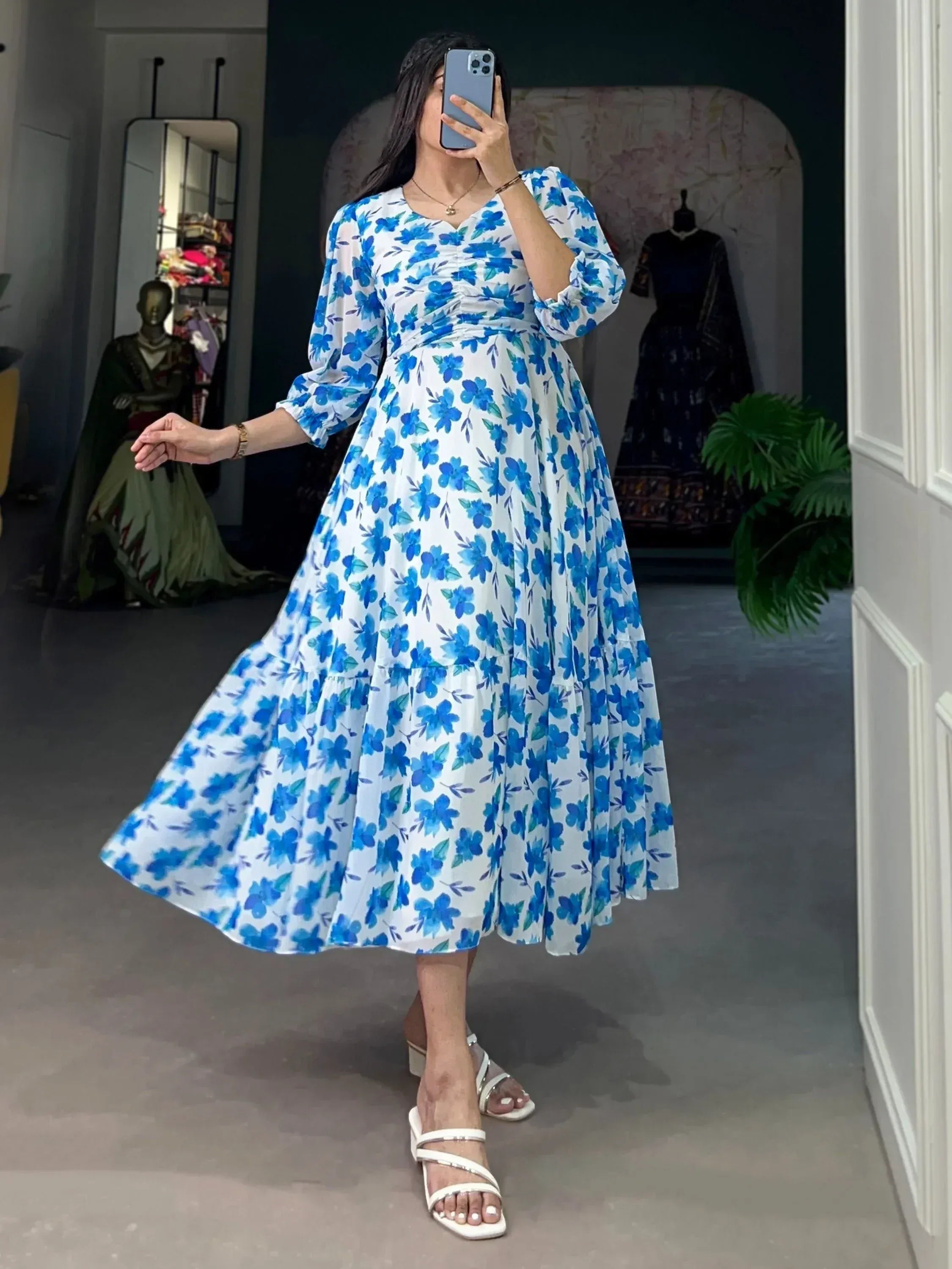 Blue floral print ethnic gown with puff sleeves, perfect for Indian occasions and festive wear
