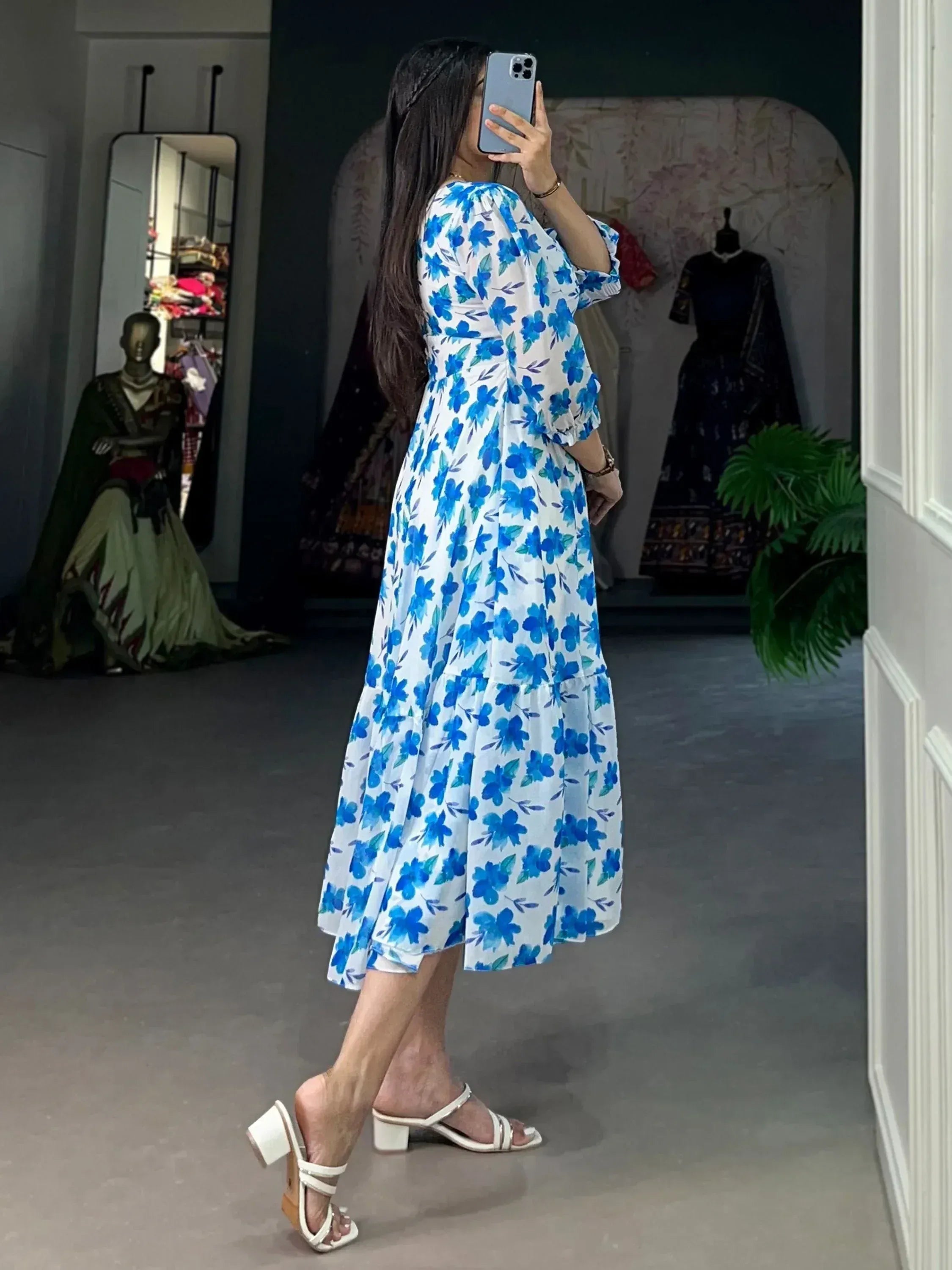 Blue floral print ethnic gown with puff sleeves, perfect for Indian occasions and festive wear.