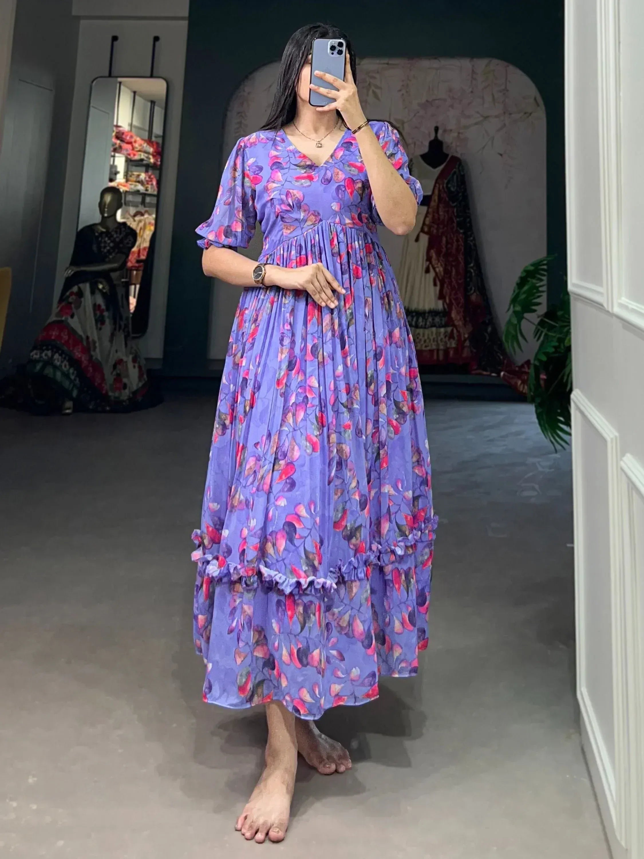 Purple floral ethnic gown with ruffled hem, V-neck, and puff sleeves for women