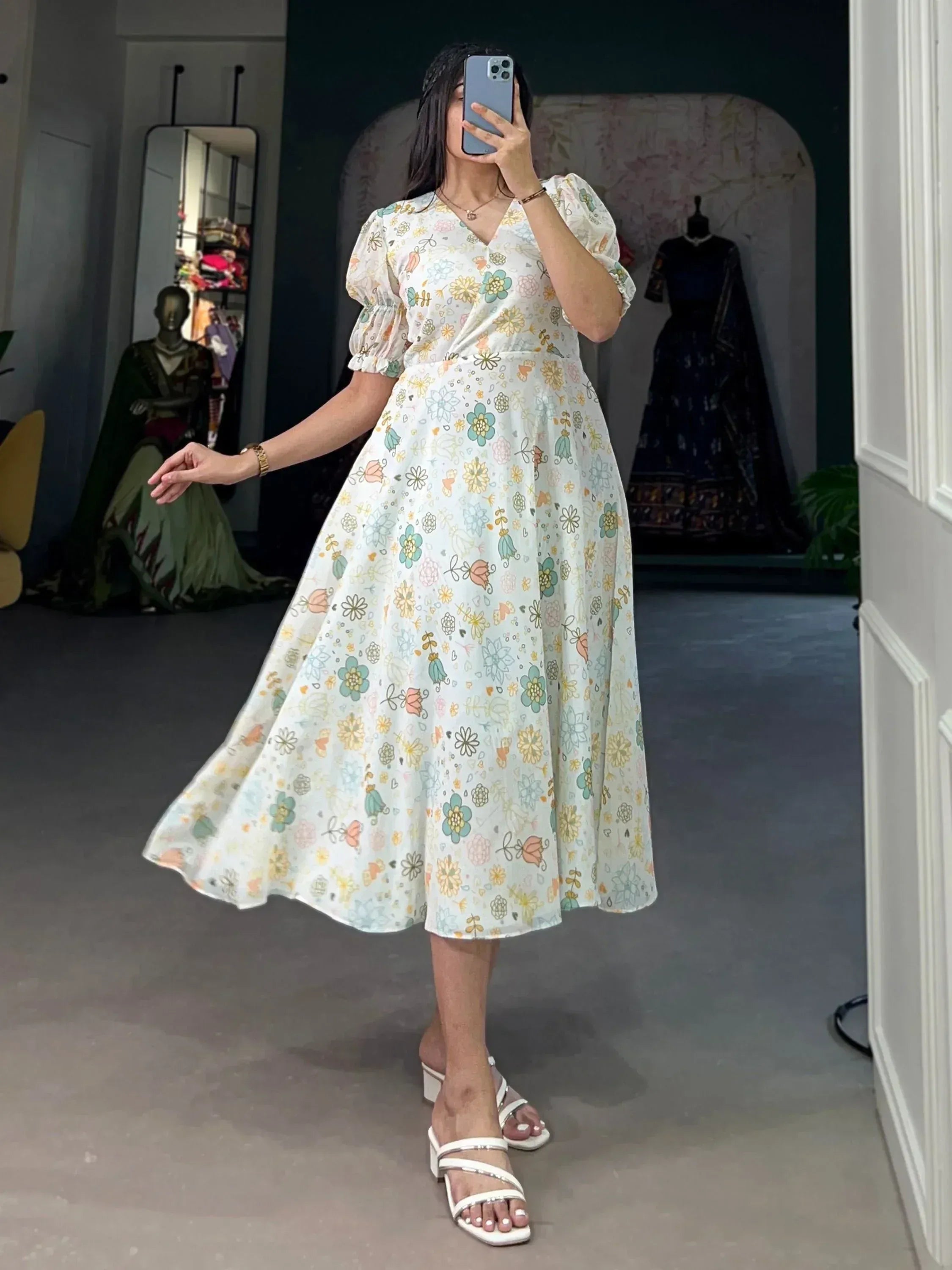 Floral print ethnic gown with puff sleeves, perfect for casual or festive occasions