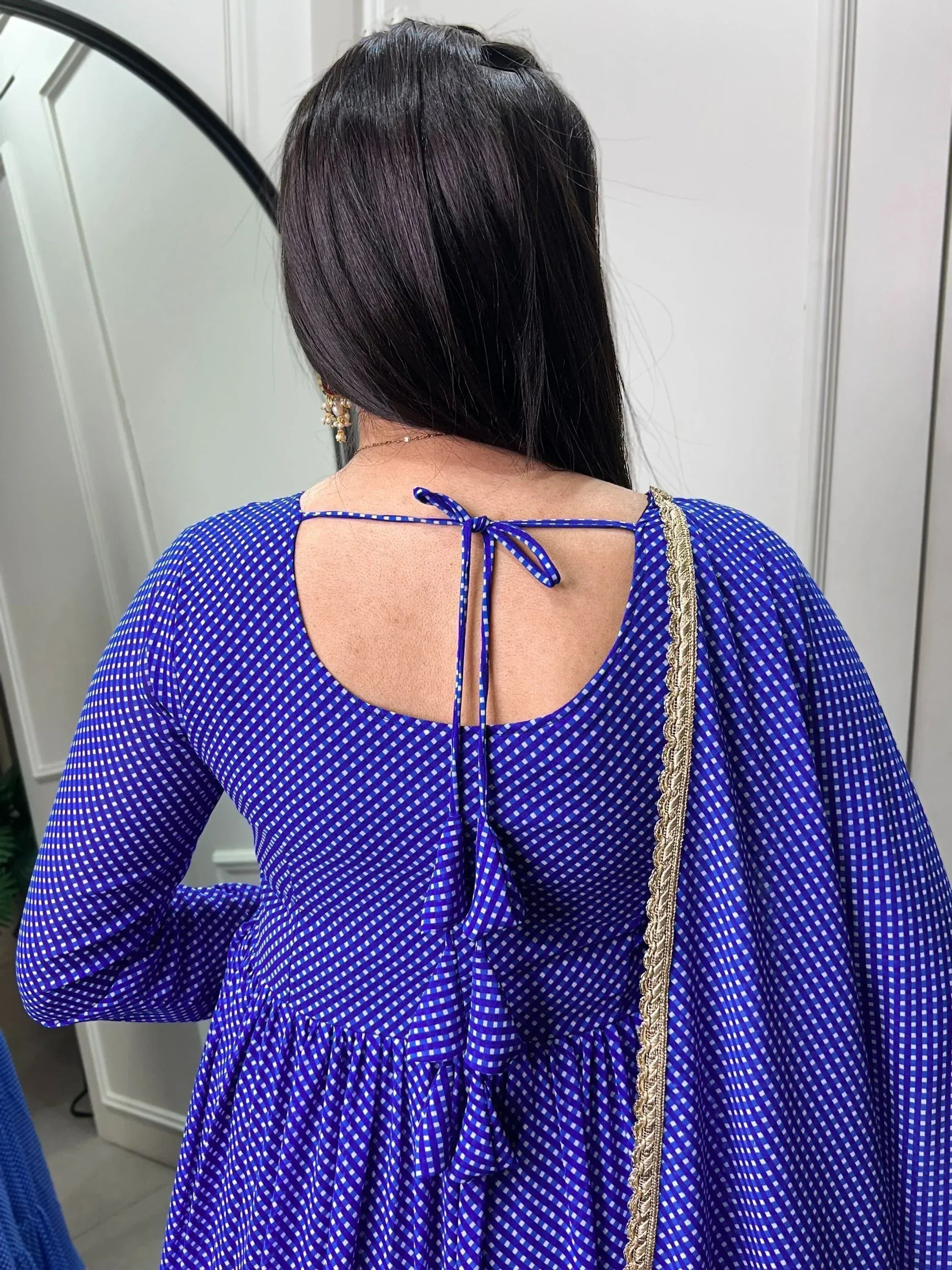 Blue and white checkered ethnic gown with back tie detail and gold trim