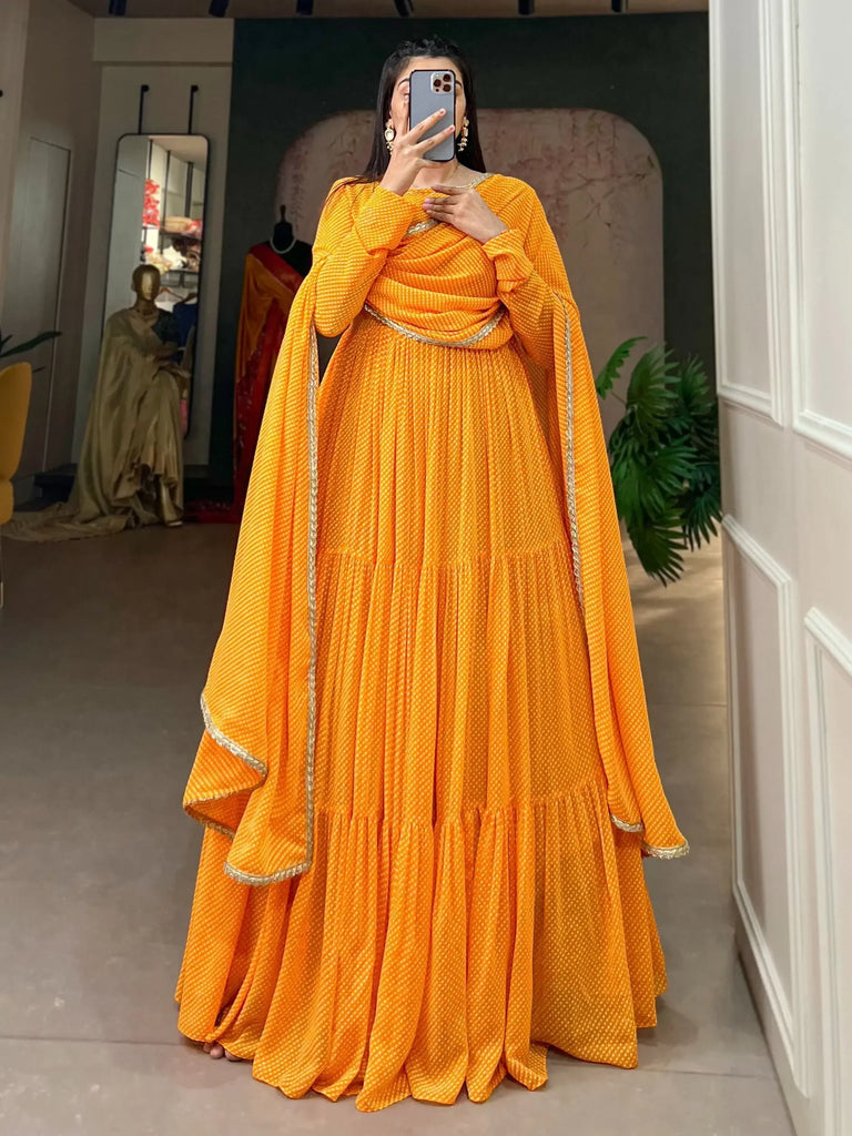 Stunning Yellow Printed Georgette Haldi Wear Gown With Dupatta