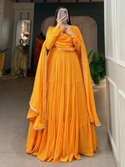 Stunning Yellow Printed Georgette Haldi Wear Gown With Dupatta