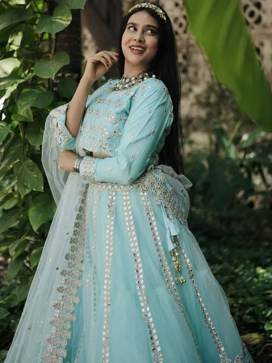 Light blue embroidered lehenga choli with mirror work, perfect for Indian ethnic occasions