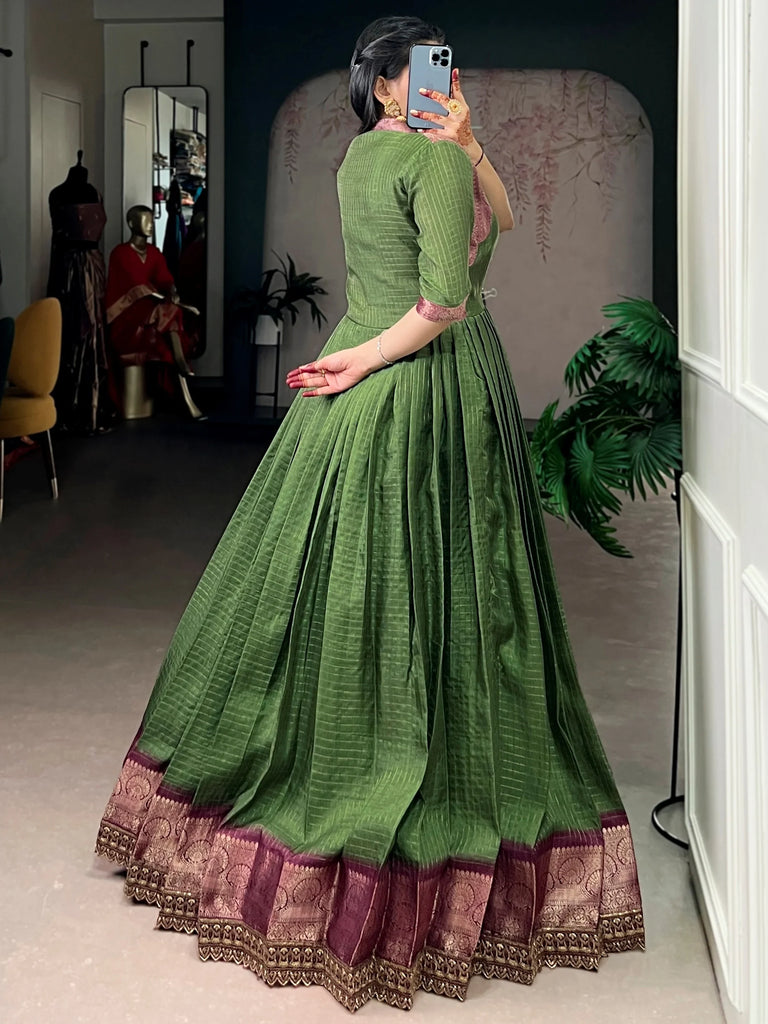 Wonderful Green Zari Weaving Silk Festival Wear Gown