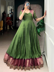 Wonderful Green Zari Weaving Silk Festival Wear Gown